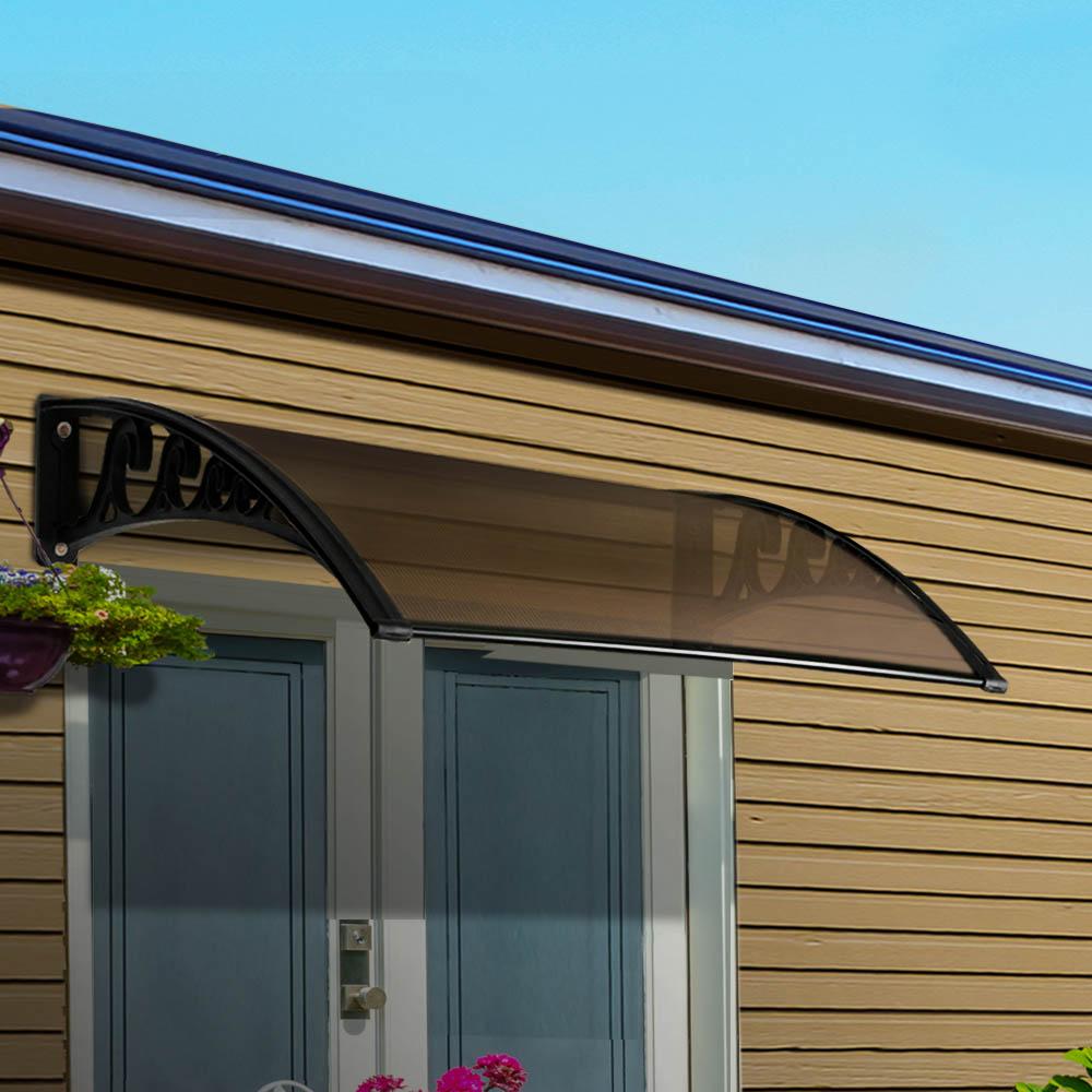 Instahut DIY Window Door Awning Shade in brown, showcasing its sleek design and durable polycarbonate panel.