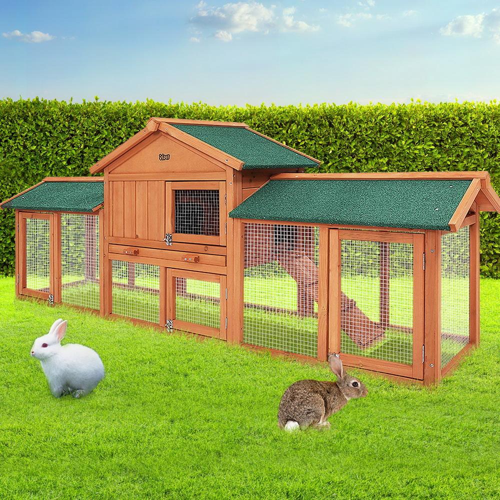 i.Pet Rabbit Hutch Chicken Coop made of fir wood, featuring a cozy upper bedroom and spacious ground play area, with a green asphalt roof.