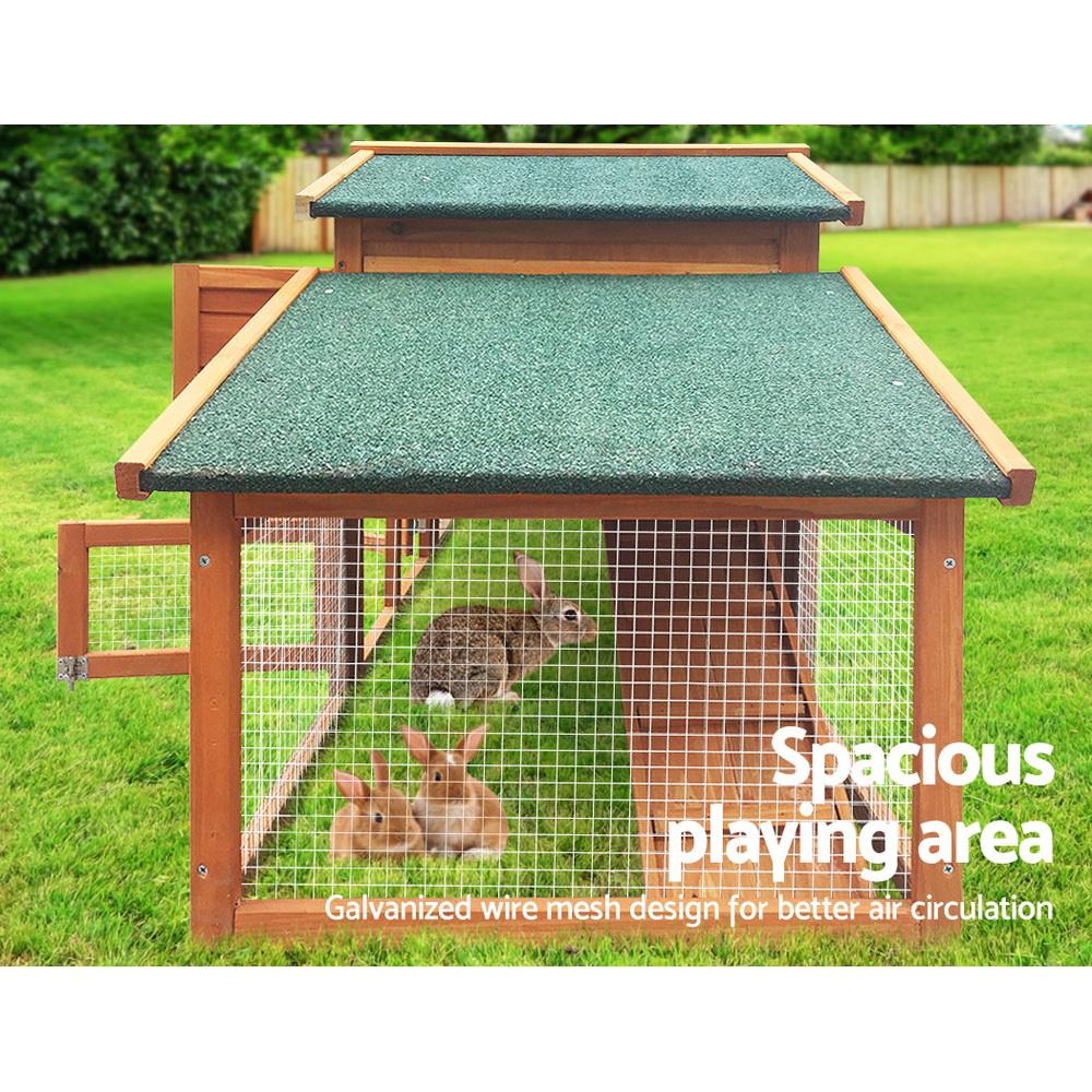 i.Pet Rabbit Hutch Chicken Coop made of fir wood, featuring a cozy upper bedroom and spacious ground play area, with a green asphalt roof.