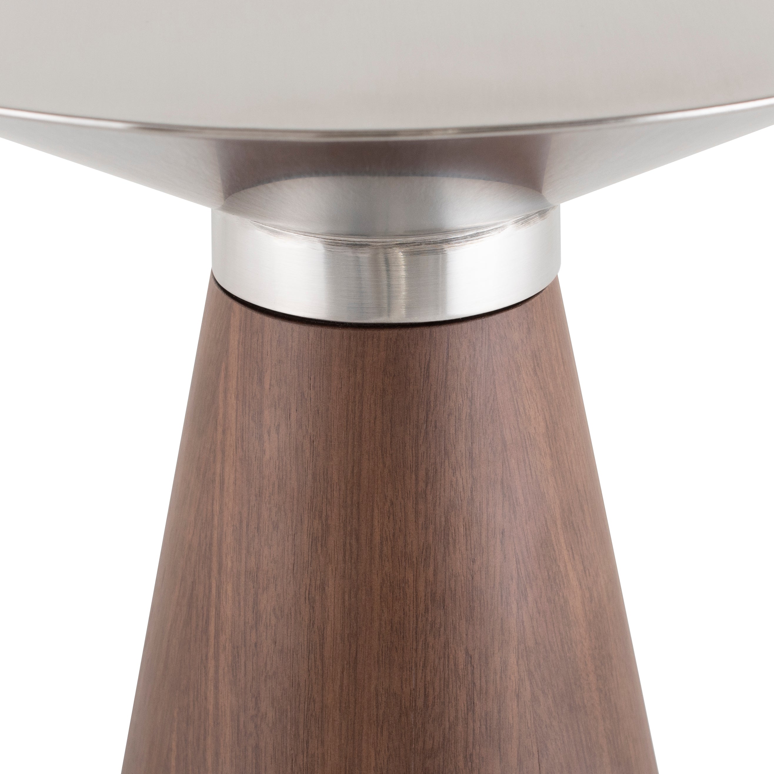 Iris Side Table featuring a brushed stainless steel top and walnut veneer base, showcasing modern design and elegance.