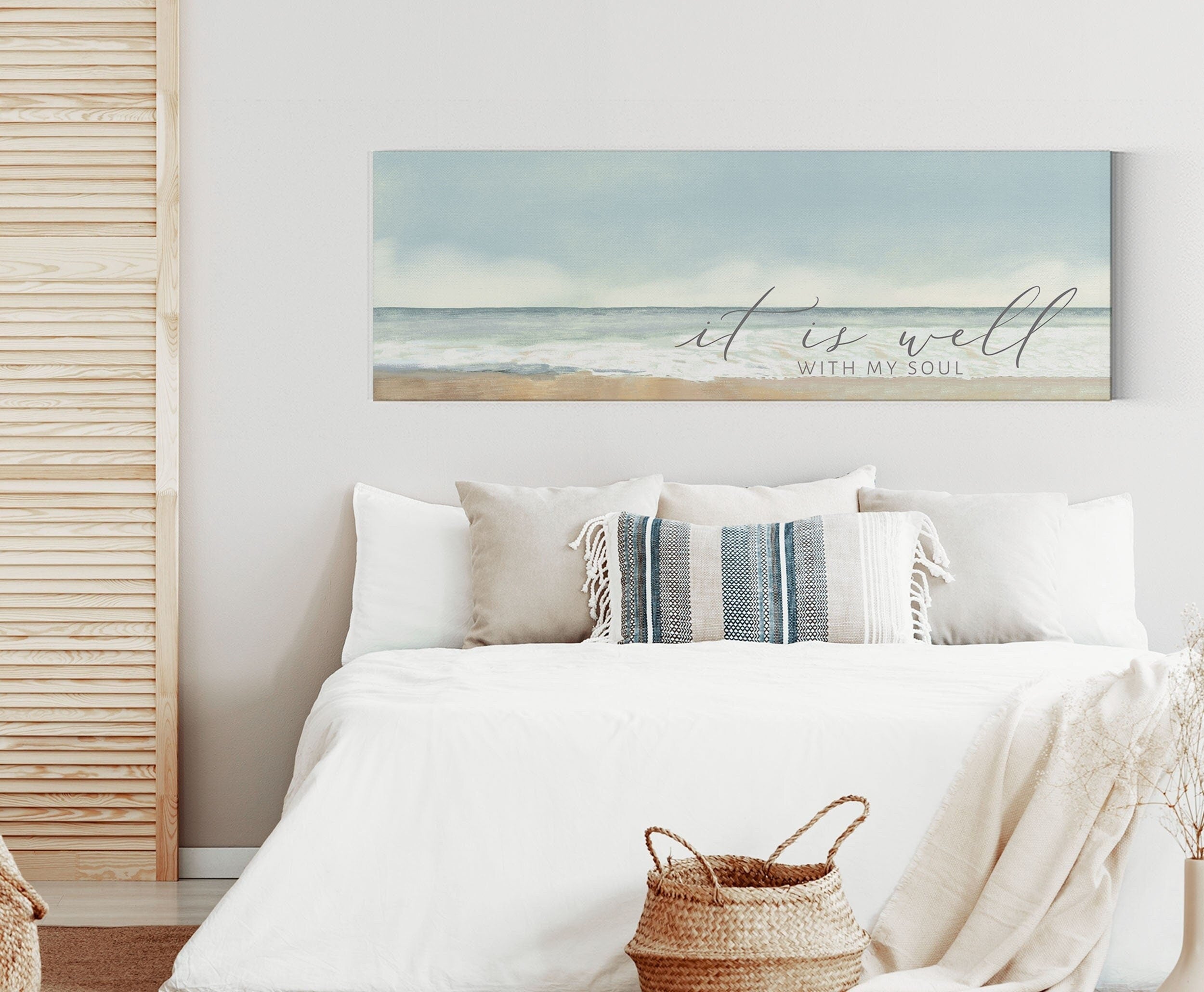 A beautiful coastal canvas wall art featuring the phrase 'It Is Well With My Soul', showcasing serene beach colors and textures.