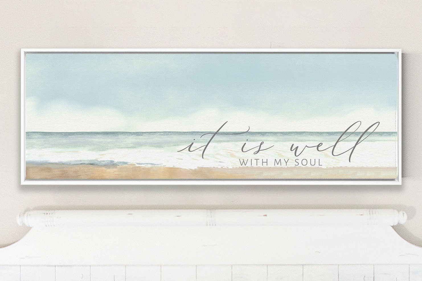 A beautiful coastal canvas wall art featuring the phrase 'It Is Well With My Soul', showcasing serene beach colors and textures.