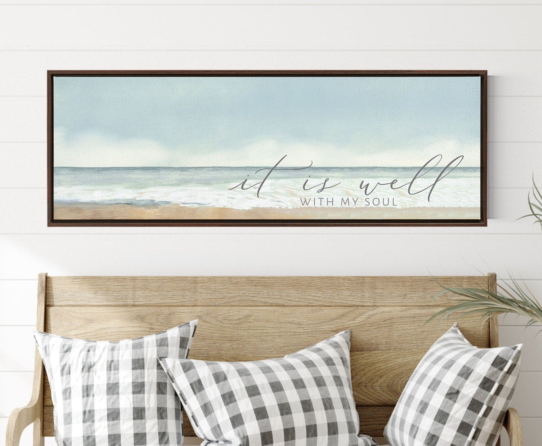 A beautiful coastal canvas wall art featuring the phrase 'It Is Well With My Soul', showcasing serene beach colors and textures.