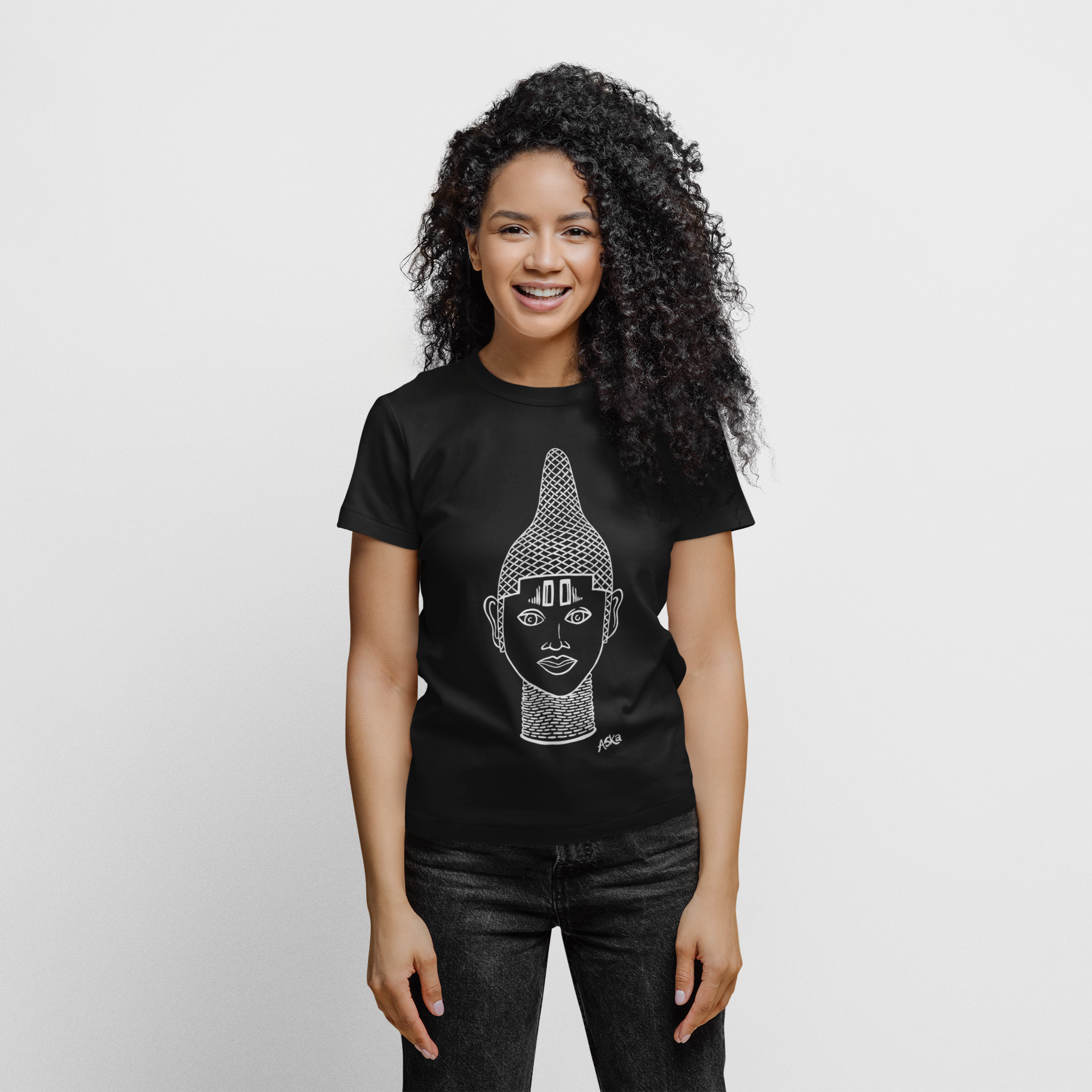 IYOBA Art Earth Positive Tee featuring Queen IDIA's face in black, white, and rose-gold prints on a white and black background, made from organic cotton.