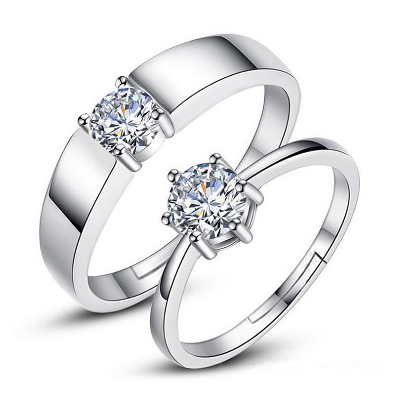 J152 S925 Sterling Silver Couple Rings featuring diamond accents, elegantly designed for couples, perfect for engagements and special occasions.