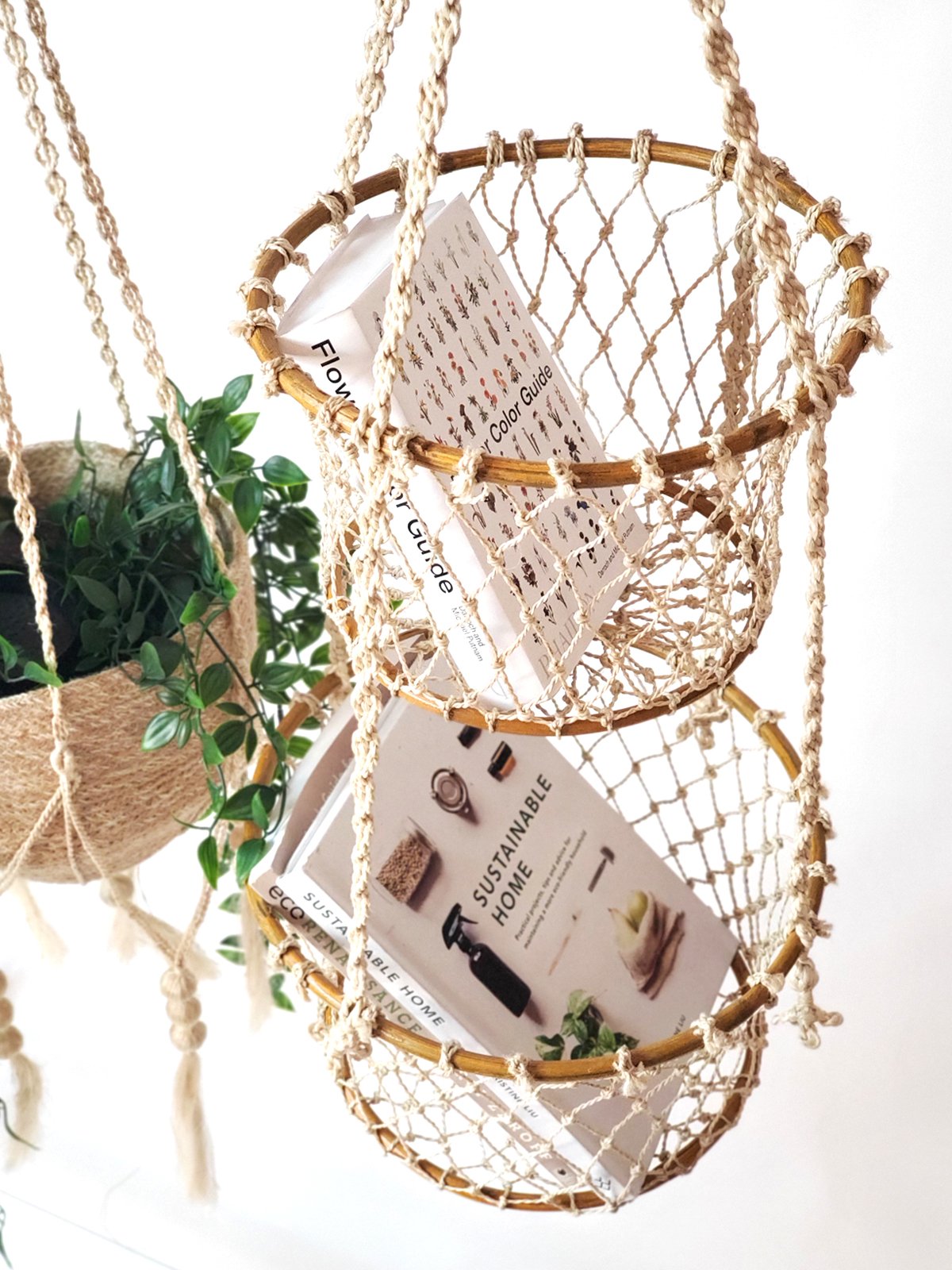 Jhuri Double Hanging Basket made from natural jute and wood, featuring two baskets for plants or storage, showcasing rustic charm.