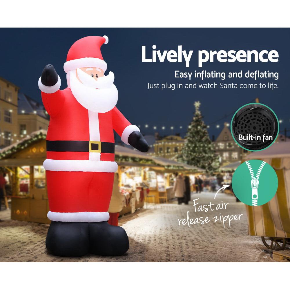 A 5-meter tall inflatable Santa Claus with LED lights, set up outdoors for Christmas decorations.