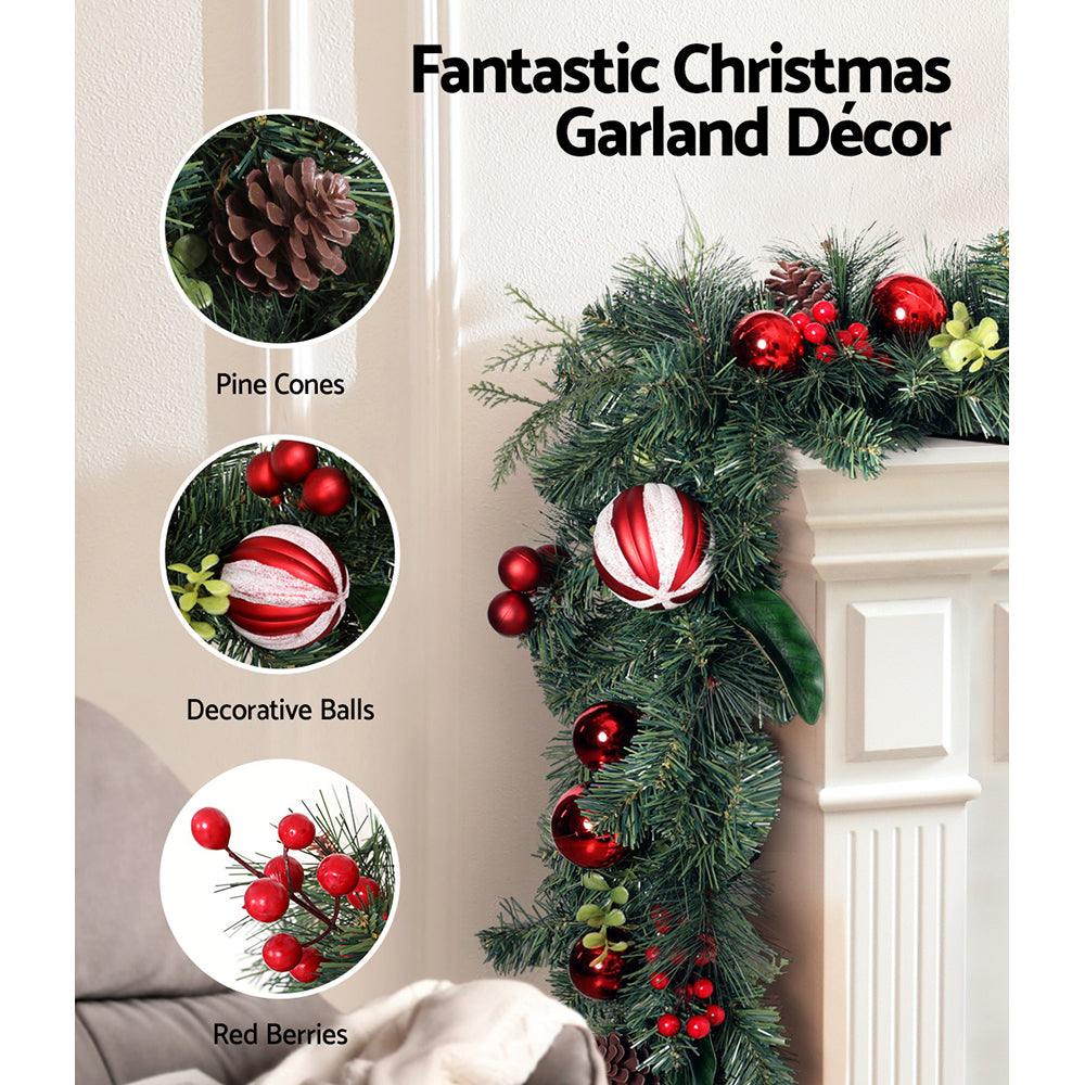 Jingle Jollys Christmas Garland and Wreath Set with red berries and pine cones, perfect for holiday decoration.