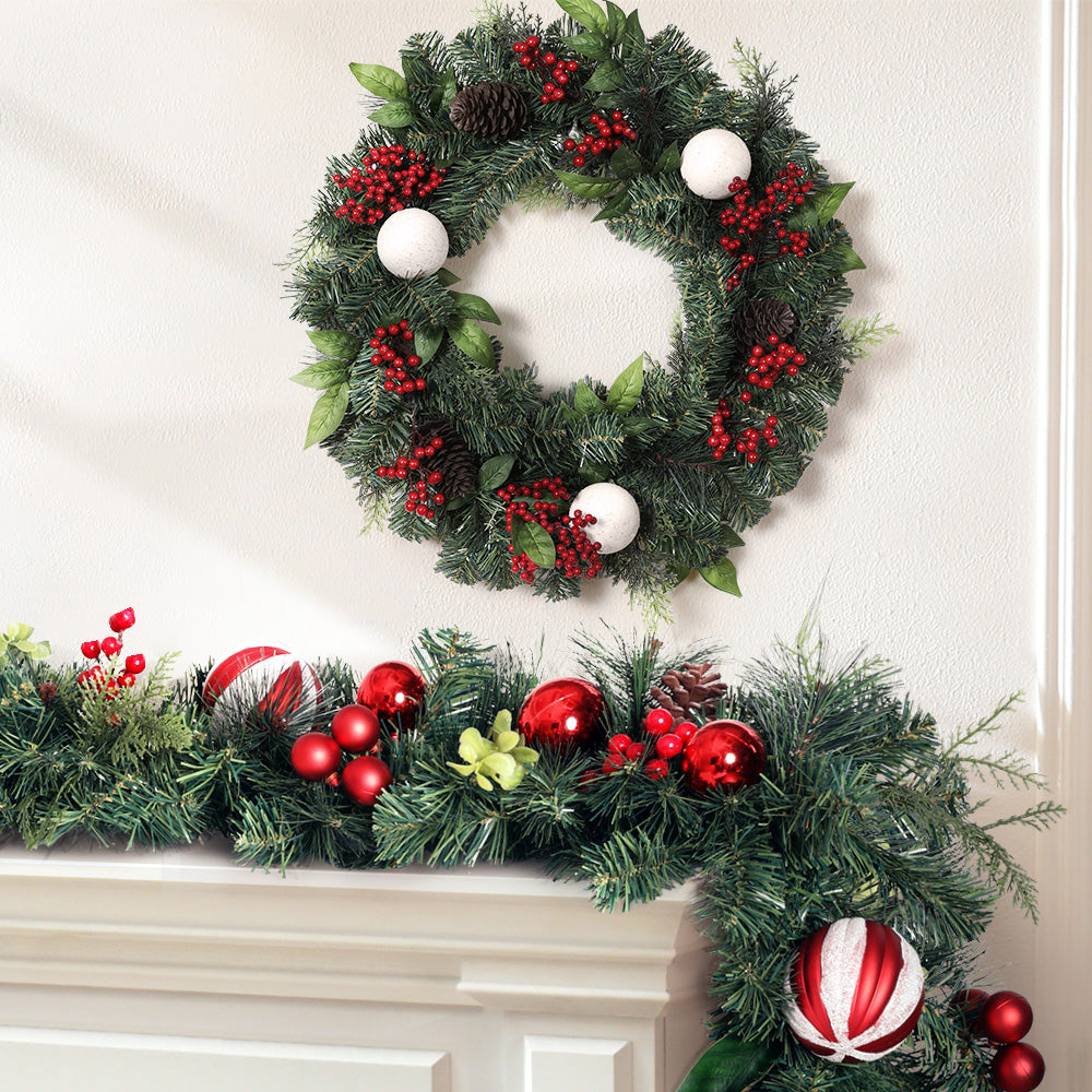 Jingle Jollys Christmas Garland and Wreath Set with red berries and pine cones, perfect for holiday decoration.