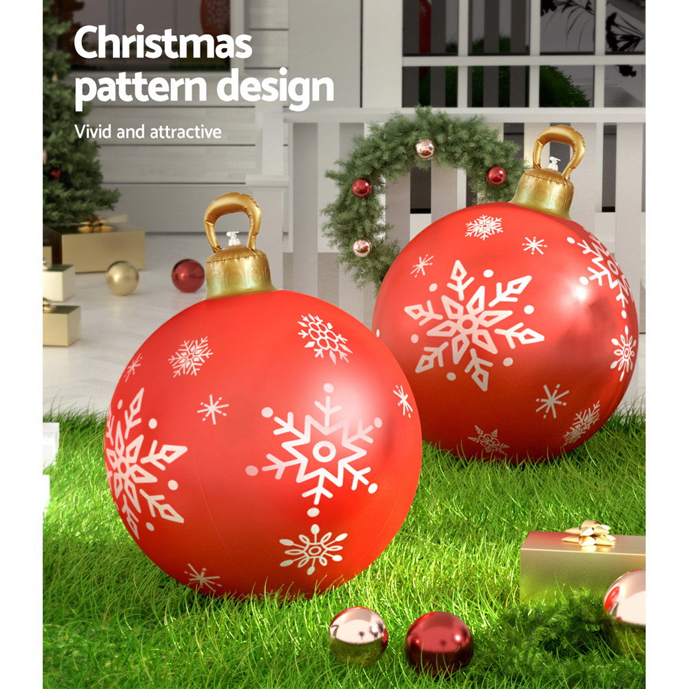 Jingle Jollys Christmas Inflatable Ball, a 60cm giant bauble in vibrant colors, perfect for festive indoor and outdoor decoration.