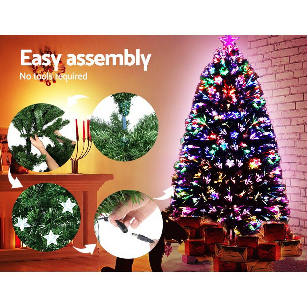 Jingle Jollys 1.5M LED Christmas Tree with colorful optic-fibre stars and a bright LED top star, showcasing a lush and realistic design.