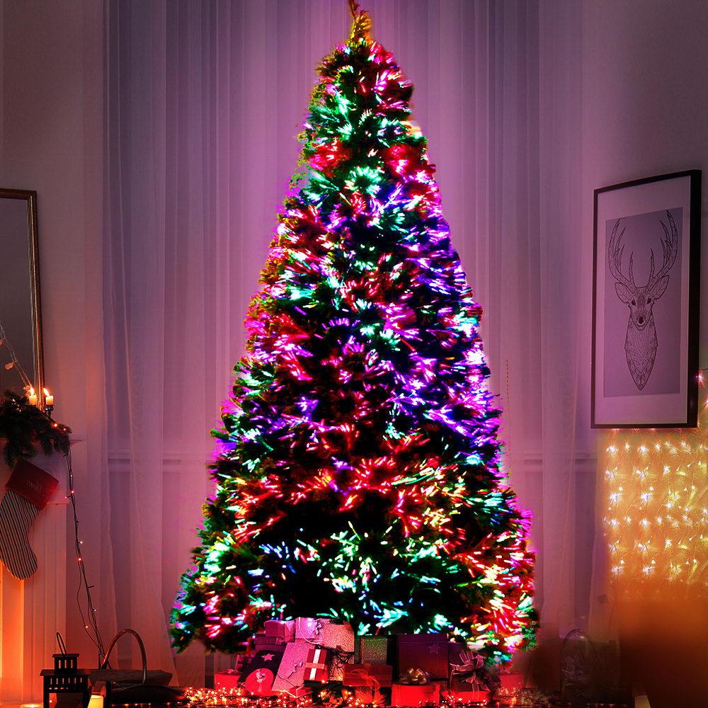 Jingle Jollys 1.8M LED Christmas tree with optic fibre lights, showcasing lush PVC tips and a sturdy metal stand, perfect for holiday decorations.