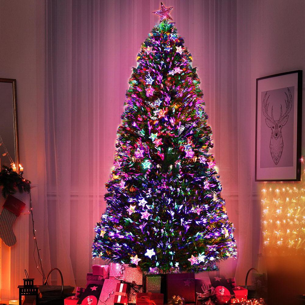 Jingle Jollys 1.8M LED Christmas Tree with colorful optic-fibre stars and a bright LED top star, showcasing a lush and realistic design.