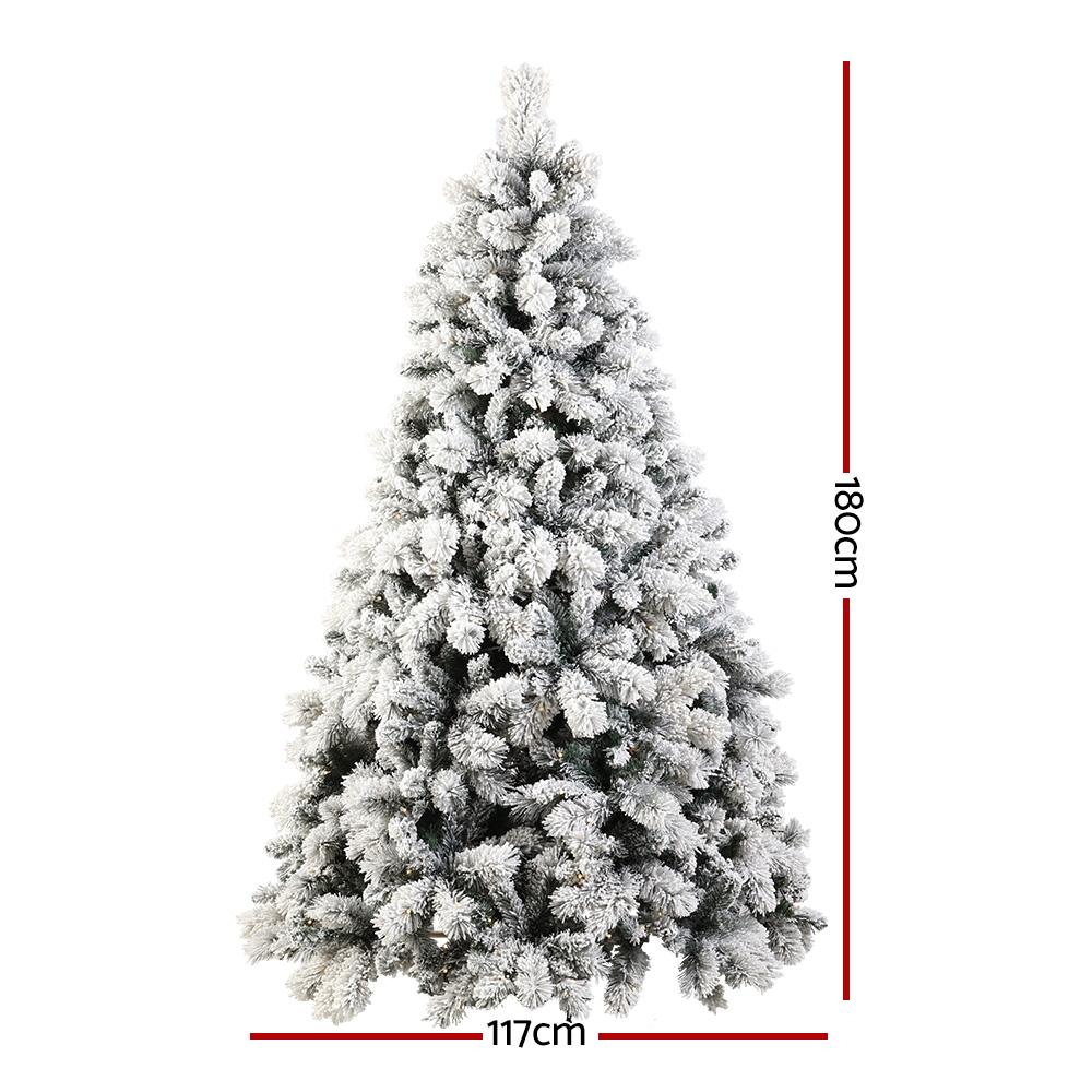 Jingle Jollys 1.8M Christmas Tree with 350 LED lights and snowy tips, showcasing its realistic appearance and lush design.