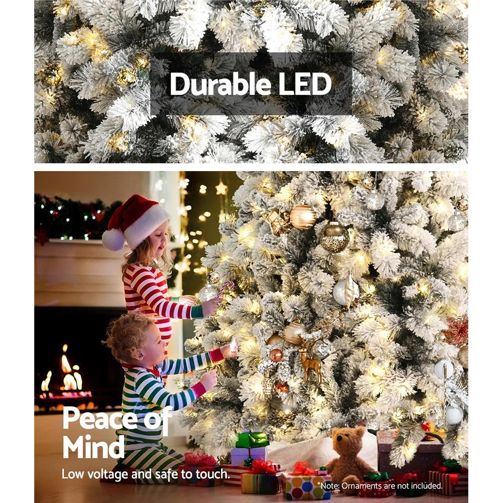 Jingle Jollys 1.8M Christmas Tree with 350 LED lights and snowy tips, showcasing its realistic appearance and lush design.