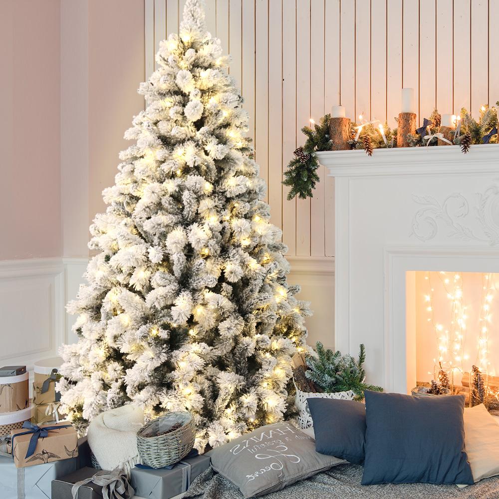 Jingle Jollys 1.8M Christmas Tree with 350 LED lights and snowy tips, showcasing its realistic appearance and lush design.