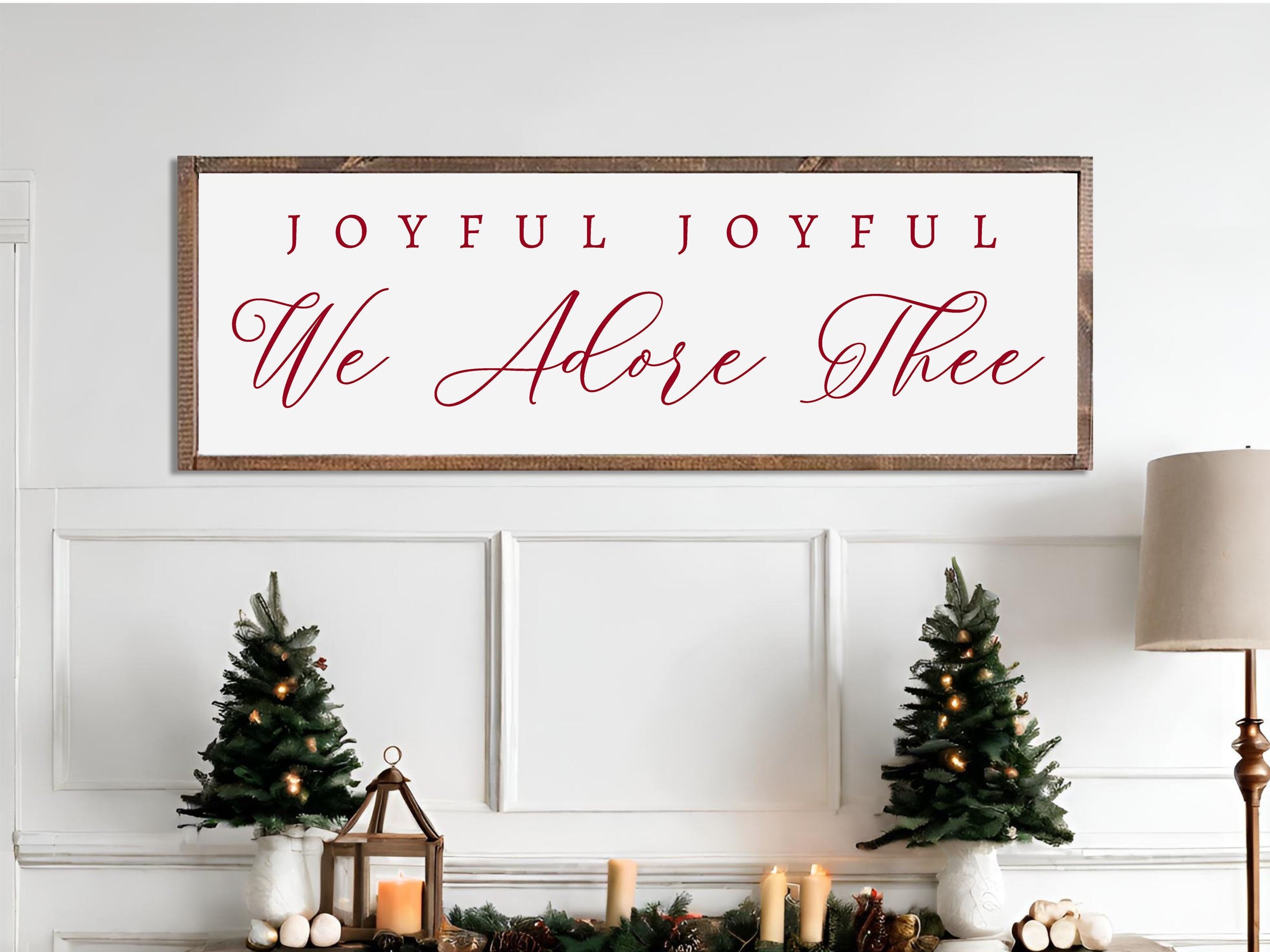 Rustic handmade Christmas wall art featuring the phrase 'Joyful Joyful We Adore Thee' on a dark walnut stained wooden background.