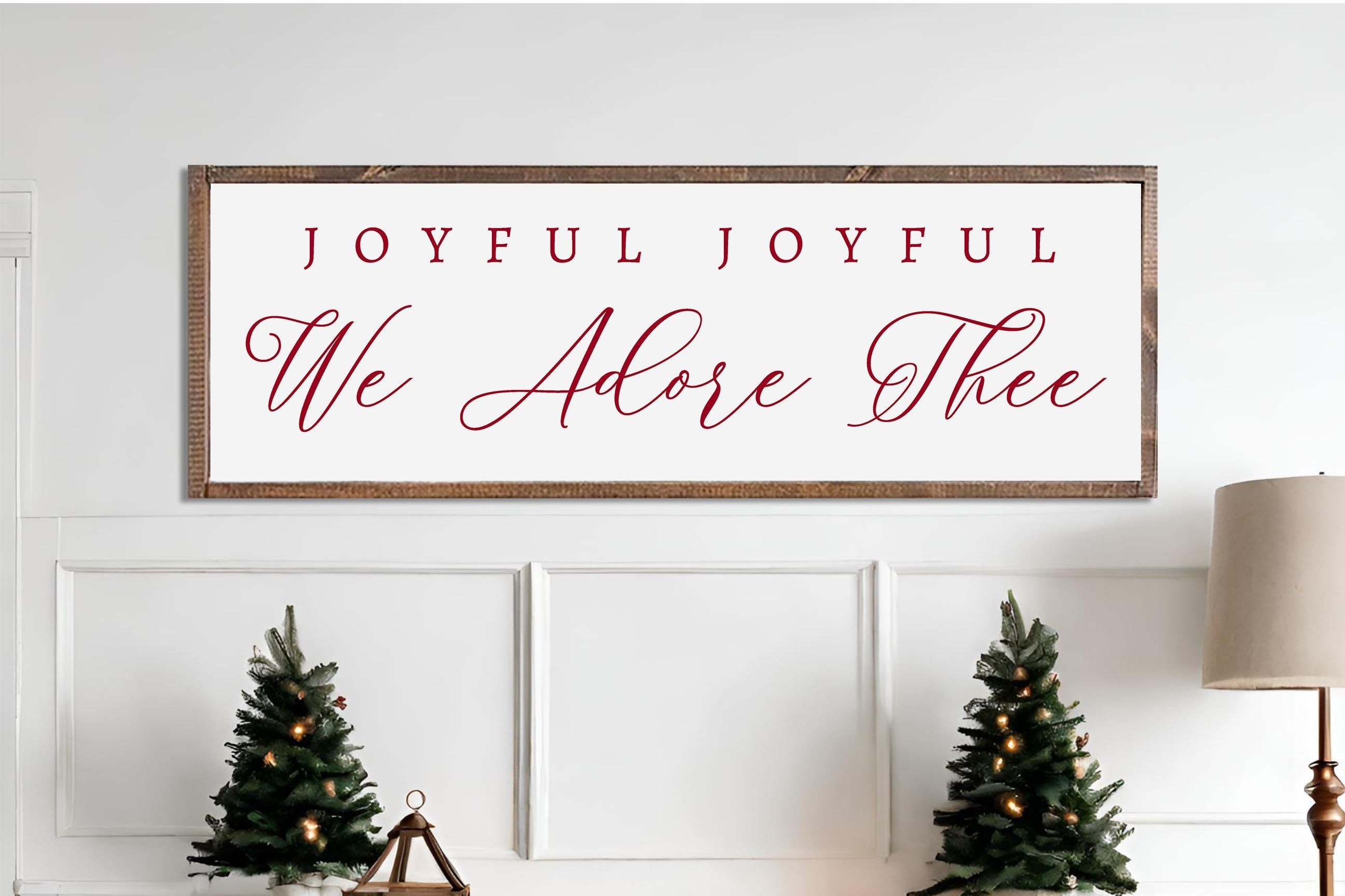 Rustic handmade Christmas wall art featuring the phrase 'Joyful Joyful We Adore Thee' on a dark walnut stained wooden background.