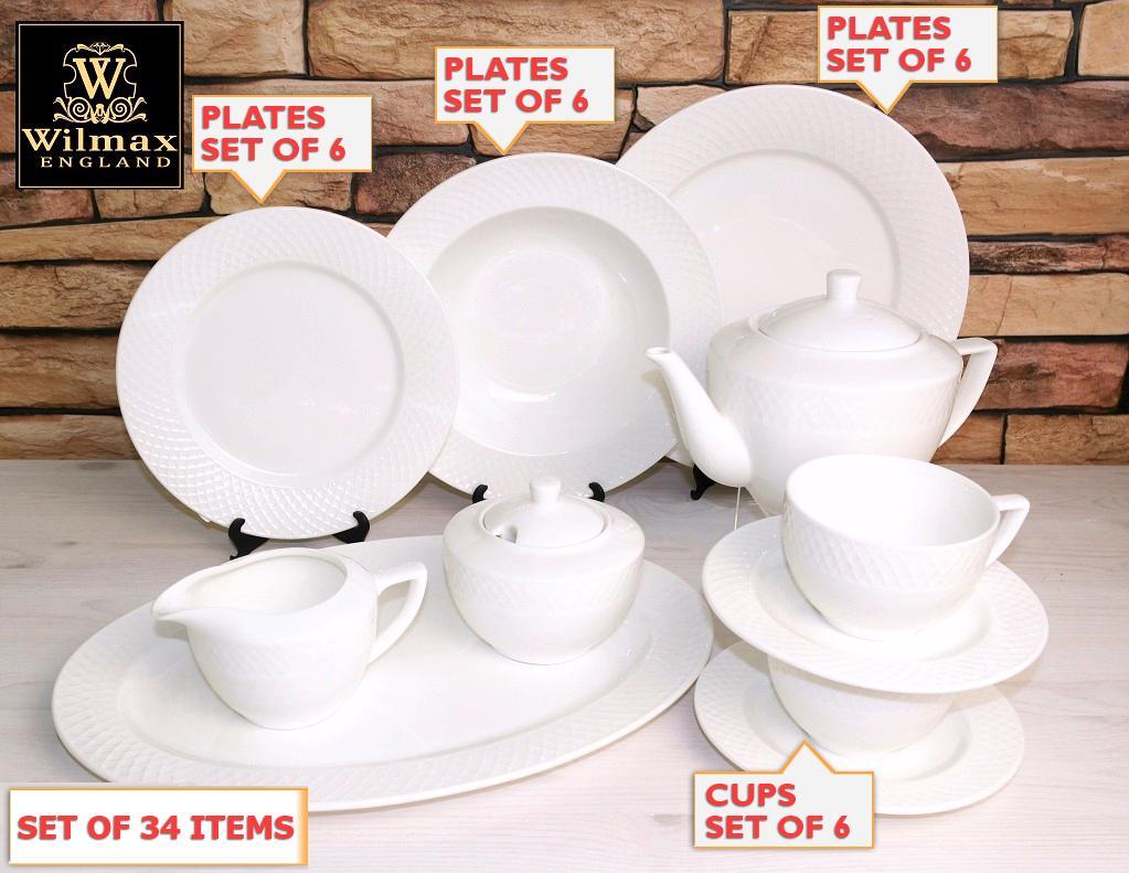 Julia Fine Dining 34 Piece Entertaining Set for 6 featuring elegant snow-white porcelain dinnerware including plates, cups, and teapot.