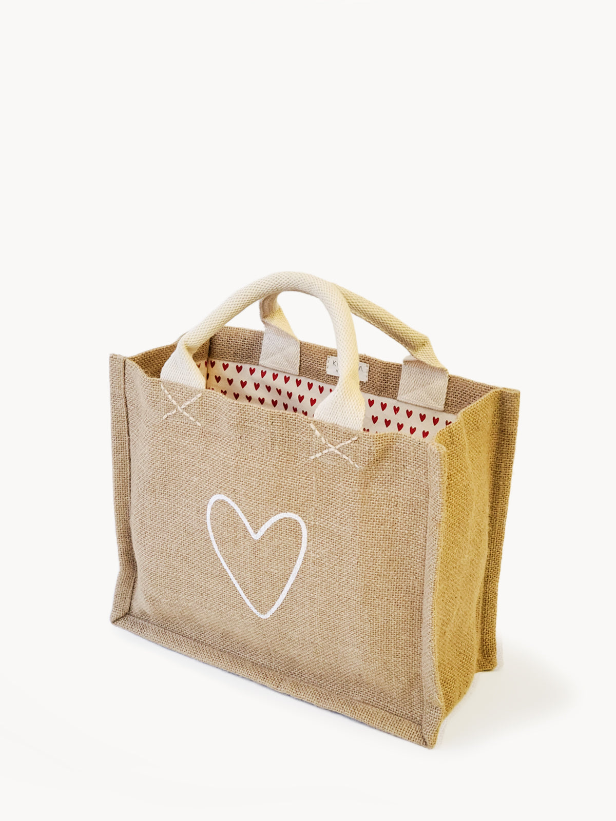 Jute Canvas Gift Bag with heart-patterned lining, showcasing a love motif, perfect for eco-friendly gifting.