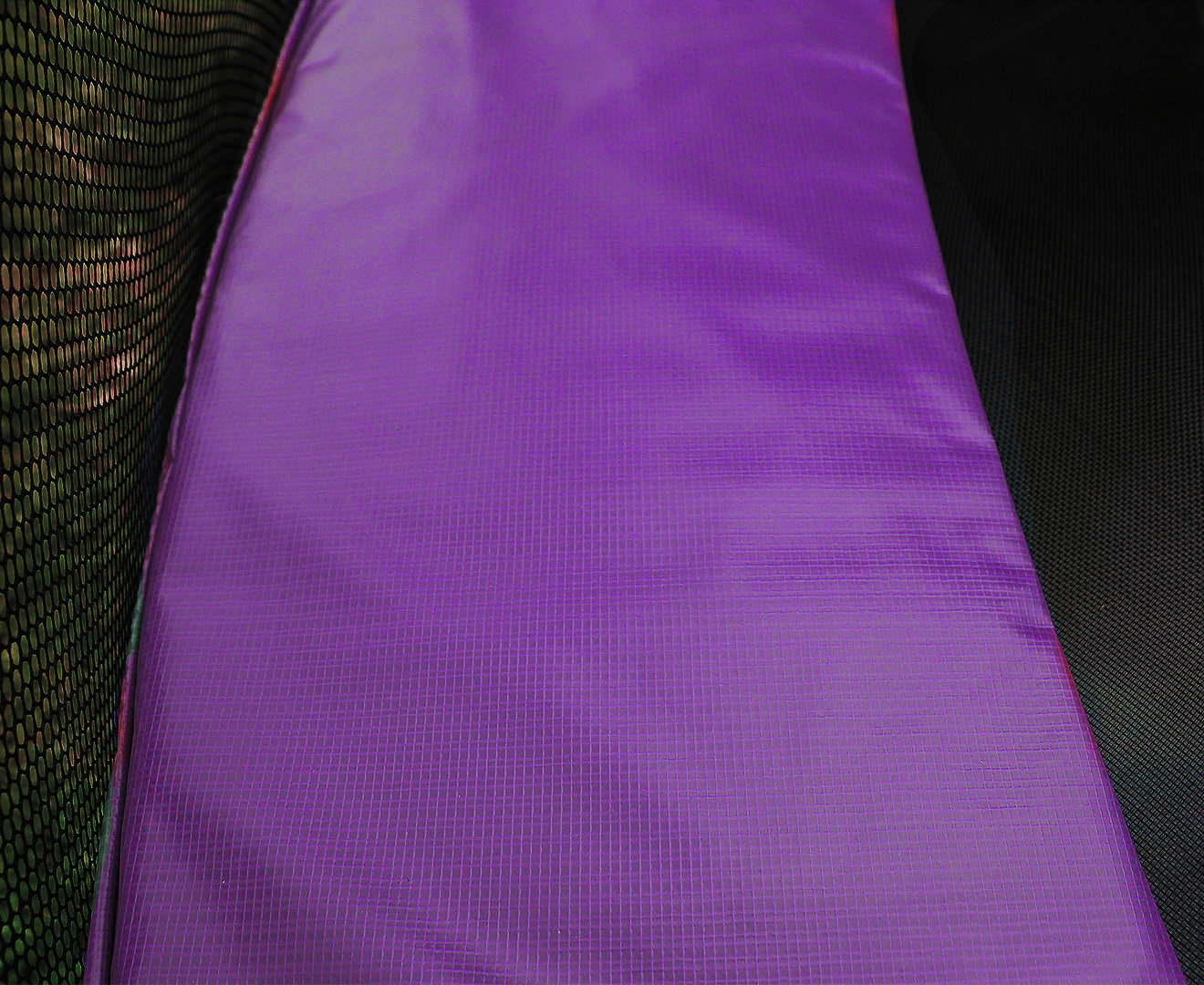 Kahuna 10ft trampoline replacement pad in purple, featuring durable weatherproof PVC and a stylish design with an 11cm skirt.