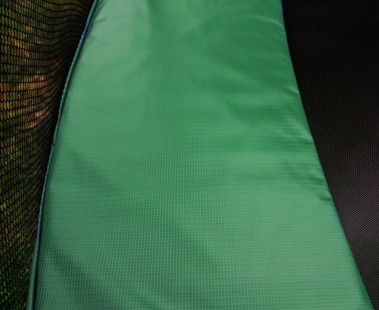 Kahuna 10ft trampoline replacement spring pad in green, featuring a durable PVC exterior and high-density foam padding.