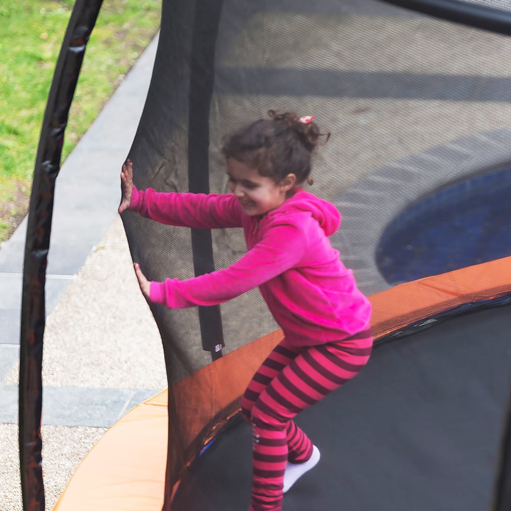 Kahuna 12ft trampoline net with reinforced weatherproof polyethylene and zip entry.