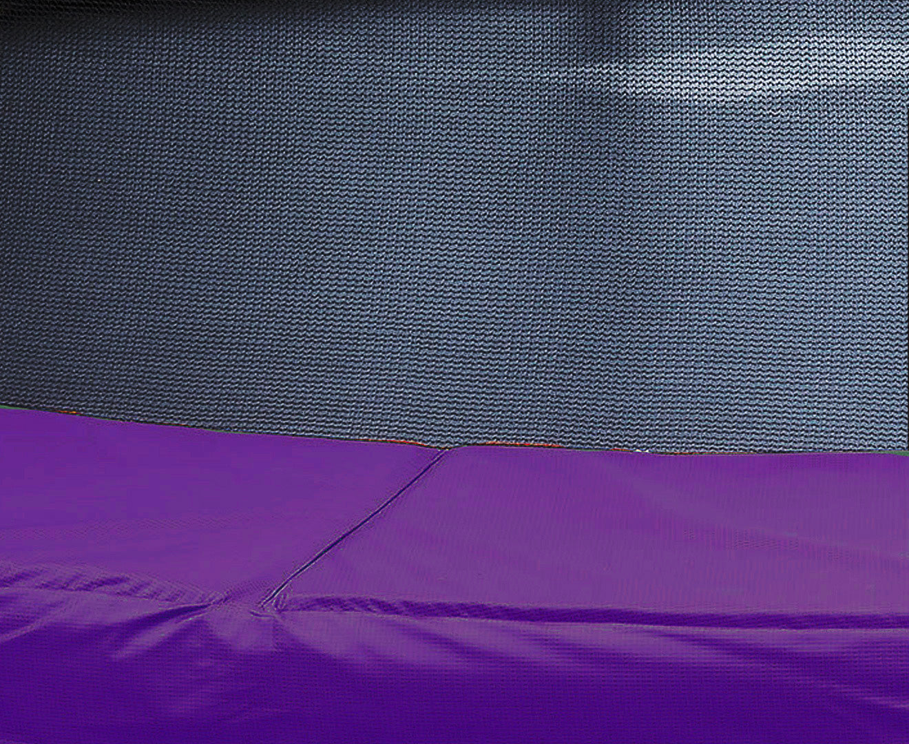 Kahuna 16ft trampoline replacement pad in purple with nylon mesh reinforcement and elastic ties for secure fitting.