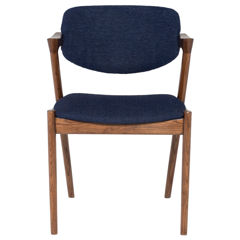 Kalli Dining Chair in True Blue with stained Ash legs and lightly padded seat, showcasing contemporary design and traditional charm.