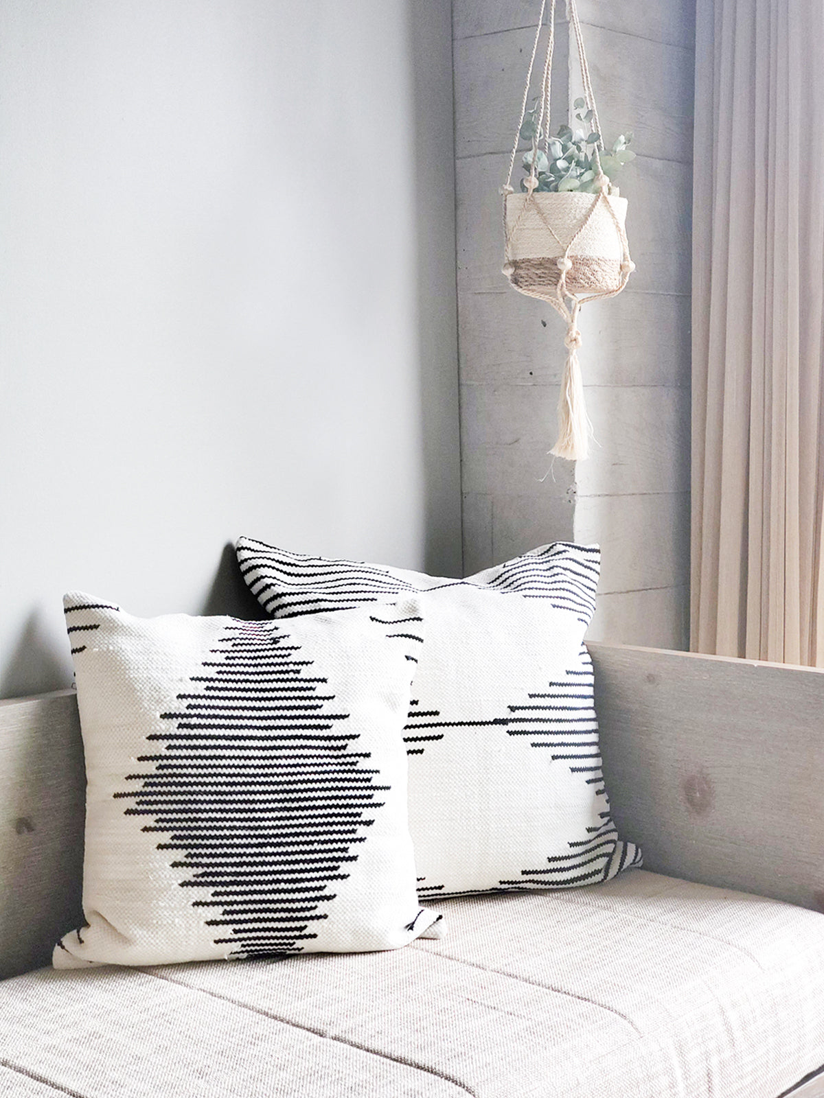 Kalo Pillow Cover made from recycled chenille scraps, featuring a soft texture and neutral black and white design, perfect for home decor.