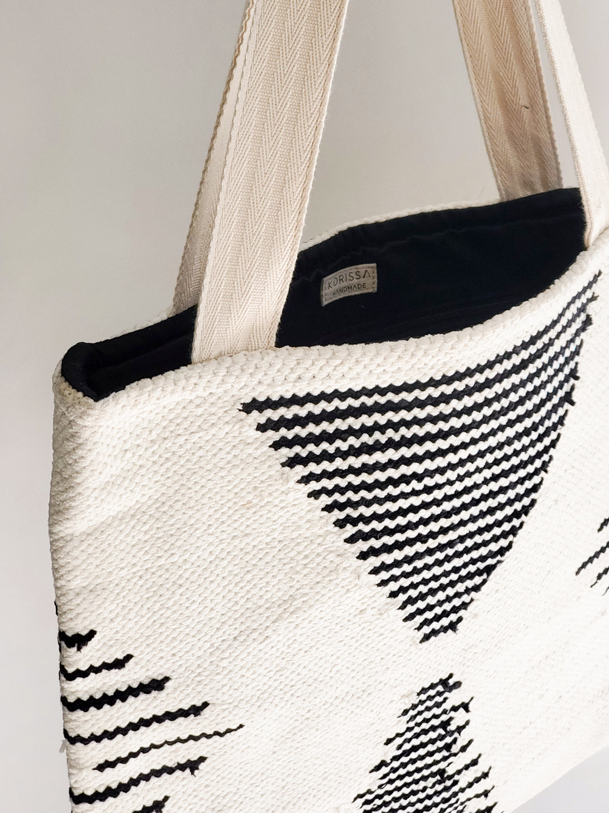 Kalo Shoulder Tote made from recycled chenille fabric, featuring a soft texture and neutral colors, ideal for daily use.