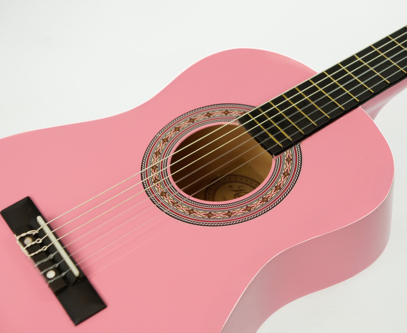 Karrera 34in Acoustic Wooden Children's Guitar in Pink, featuring a sleek design and quality craftsmanship, perfect for young musicians.