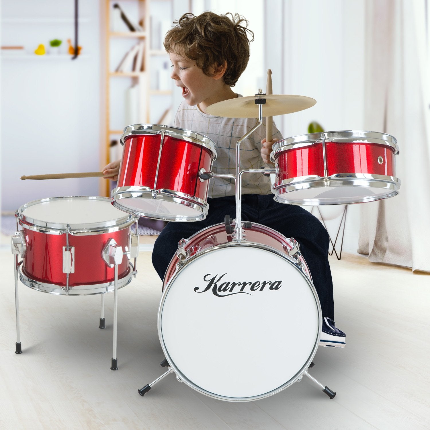 Karrera Children's 4pc Drum Kit in Red, featuring a bass drum, tom drums, snare drum, cymbal, and drumsticks, designed for young aspiring drummers.