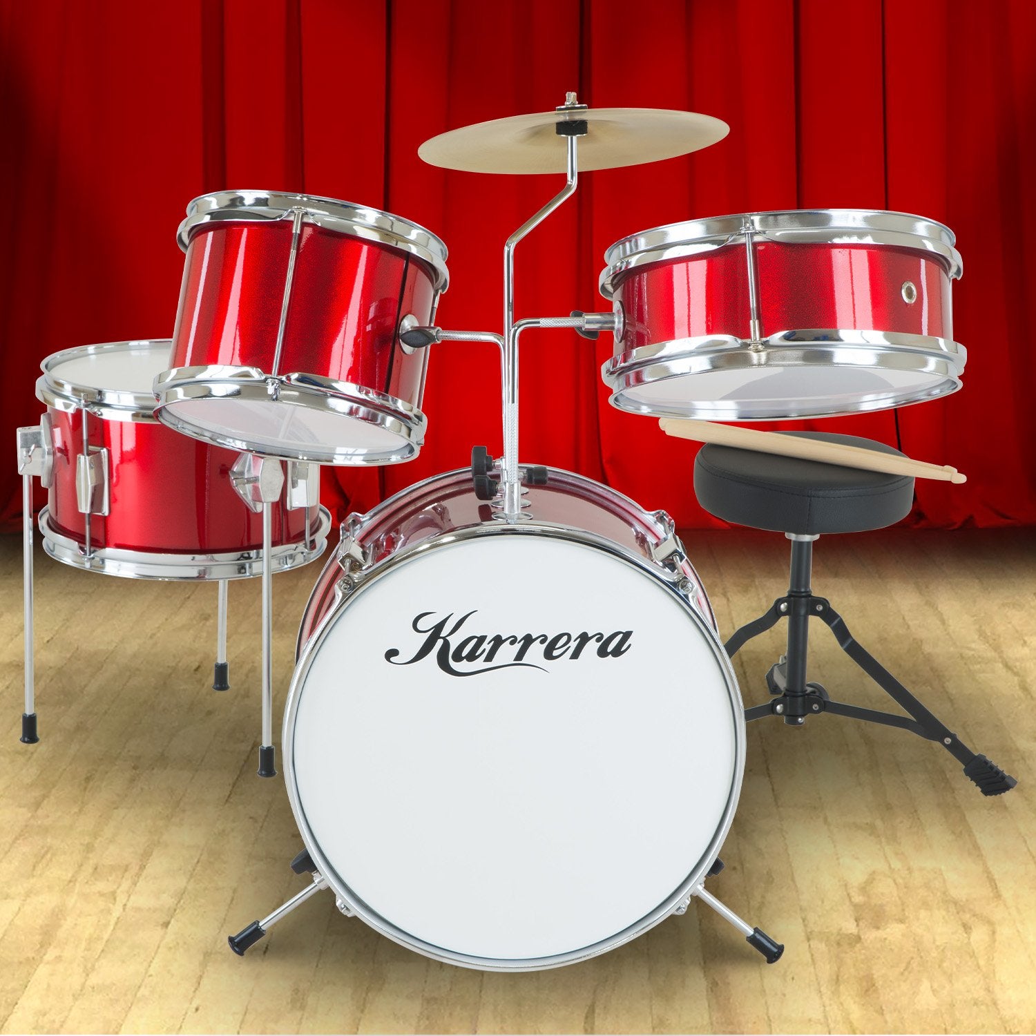 Karrera Children's 4pc Drum Kit in Red, featuring a bass drum, tom drums, snare drum, cymbal, and drumsticks, designed for young aspiring drummers.