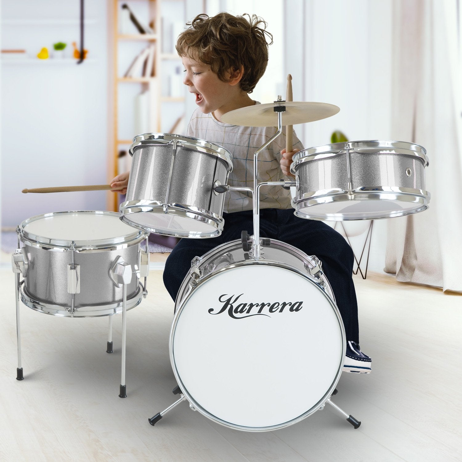 Karrera Children's 4pc Drum Kit in silver with drumsticks, stool, and cymbal, designed for young drummers.