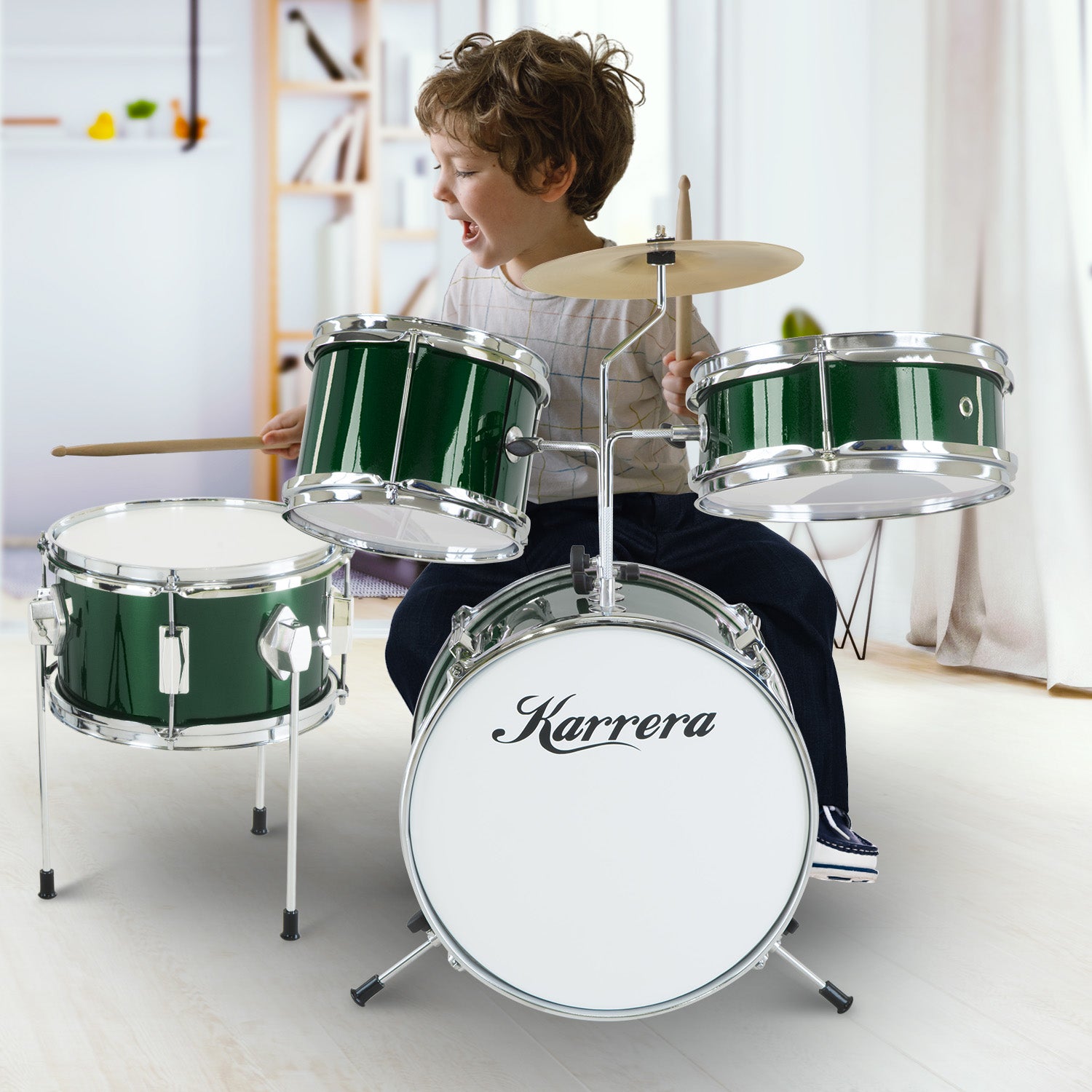 Karrera Children's 4pc Drumkit in Green with metallic finish, featuring bass drum, tom drums, snare drum, cymbal, and drumsticks.