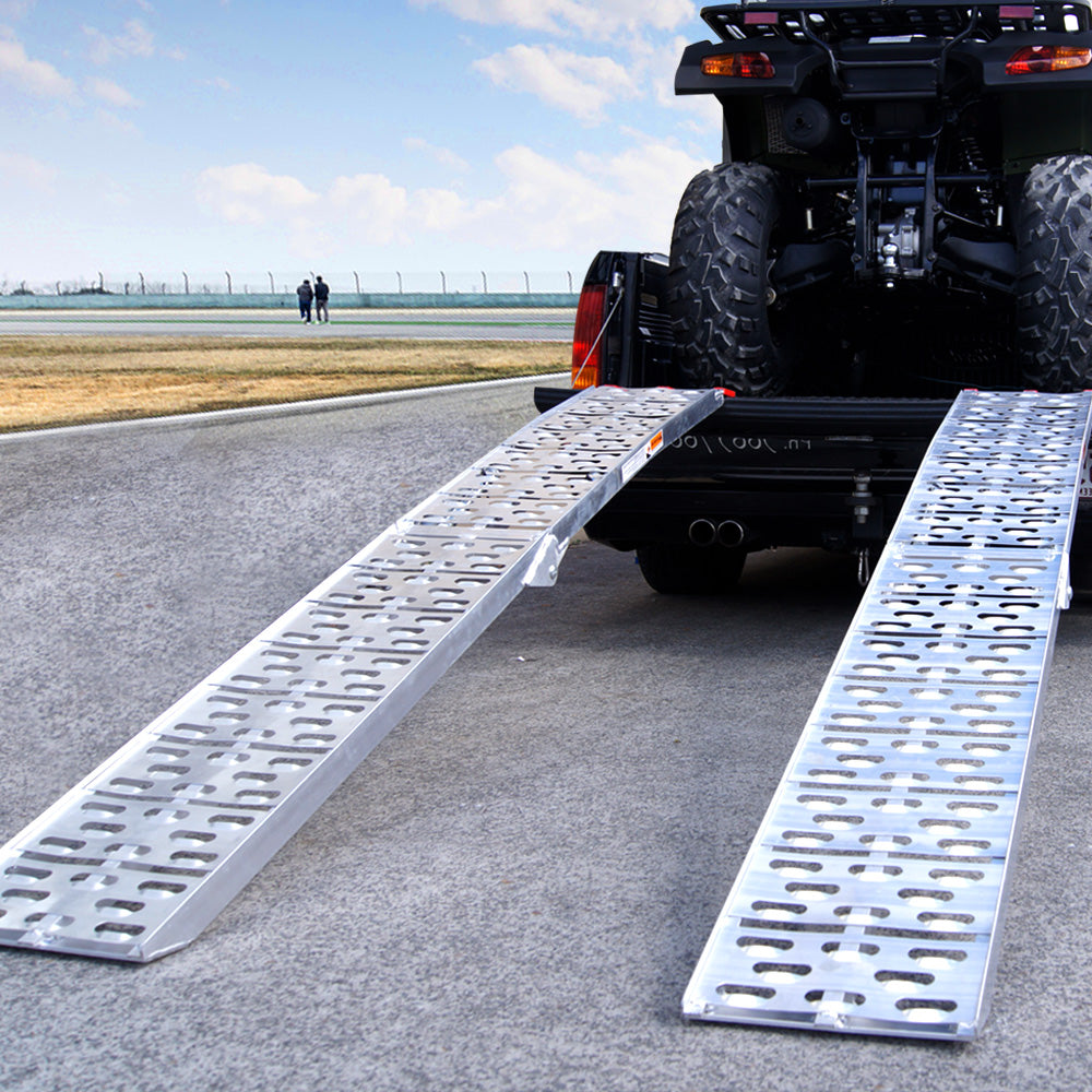 Kartrite 2x Aluminium Folding Loading Ramps designed for ATVs and motorbikes, showcasing their sturdy construction and safety features.