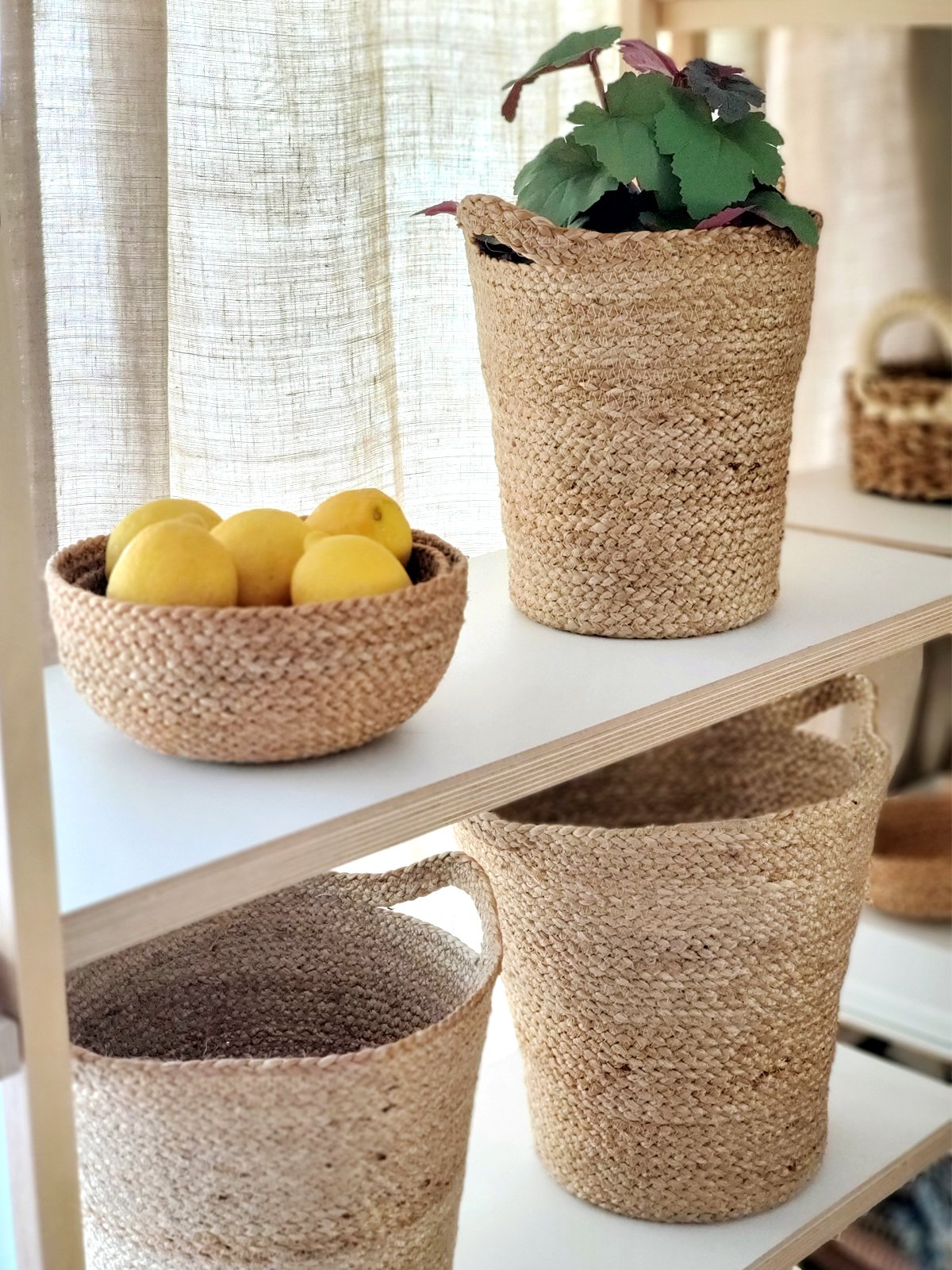 Kata Basket with Slit Handle, handwoven from natural jute, showcasing its unique design and functionality.