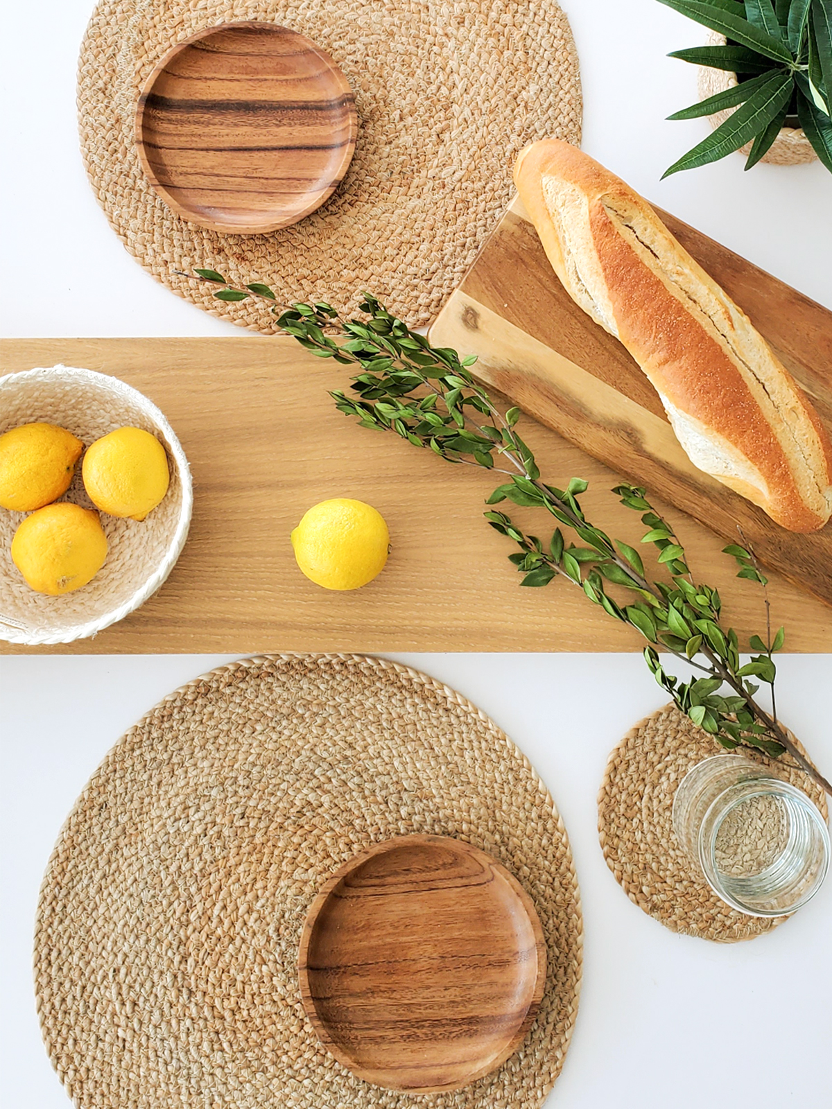 Set of 4 handwoven jute placemats in natural color, perfect for dining tables.