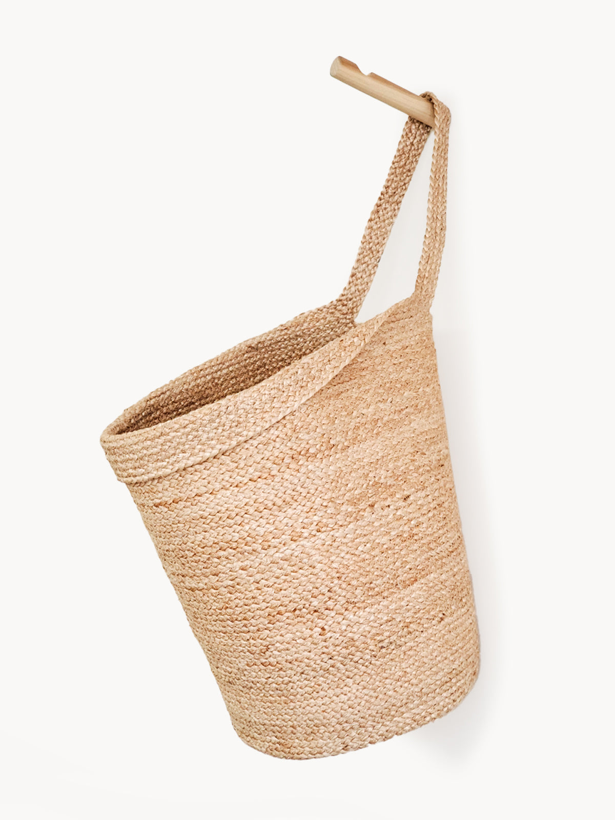 Kata Wall Storage Basket made of handwoven natural jute, showcasing its unique texture and design, perfect for home organization.