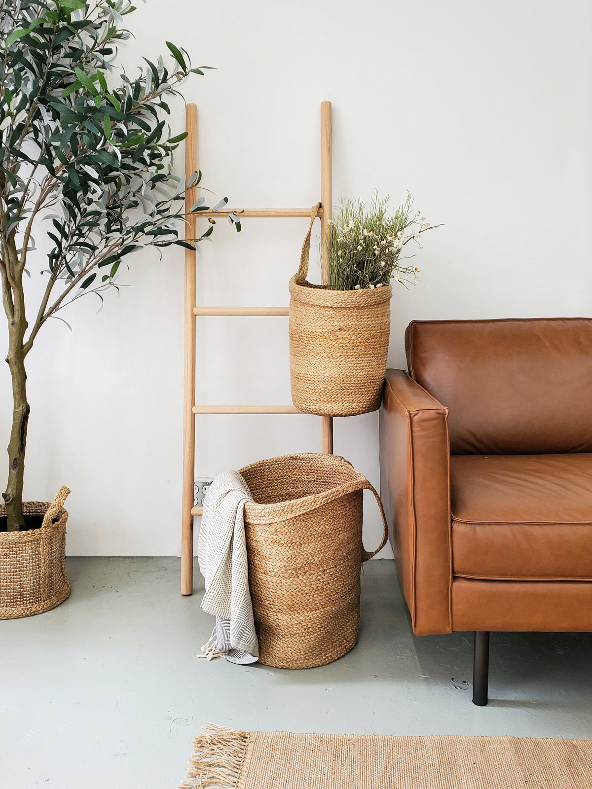 Kata Wall Storage Basket made of handwoven natural jute, showcasing its unique texture and design, perfect for home organization.