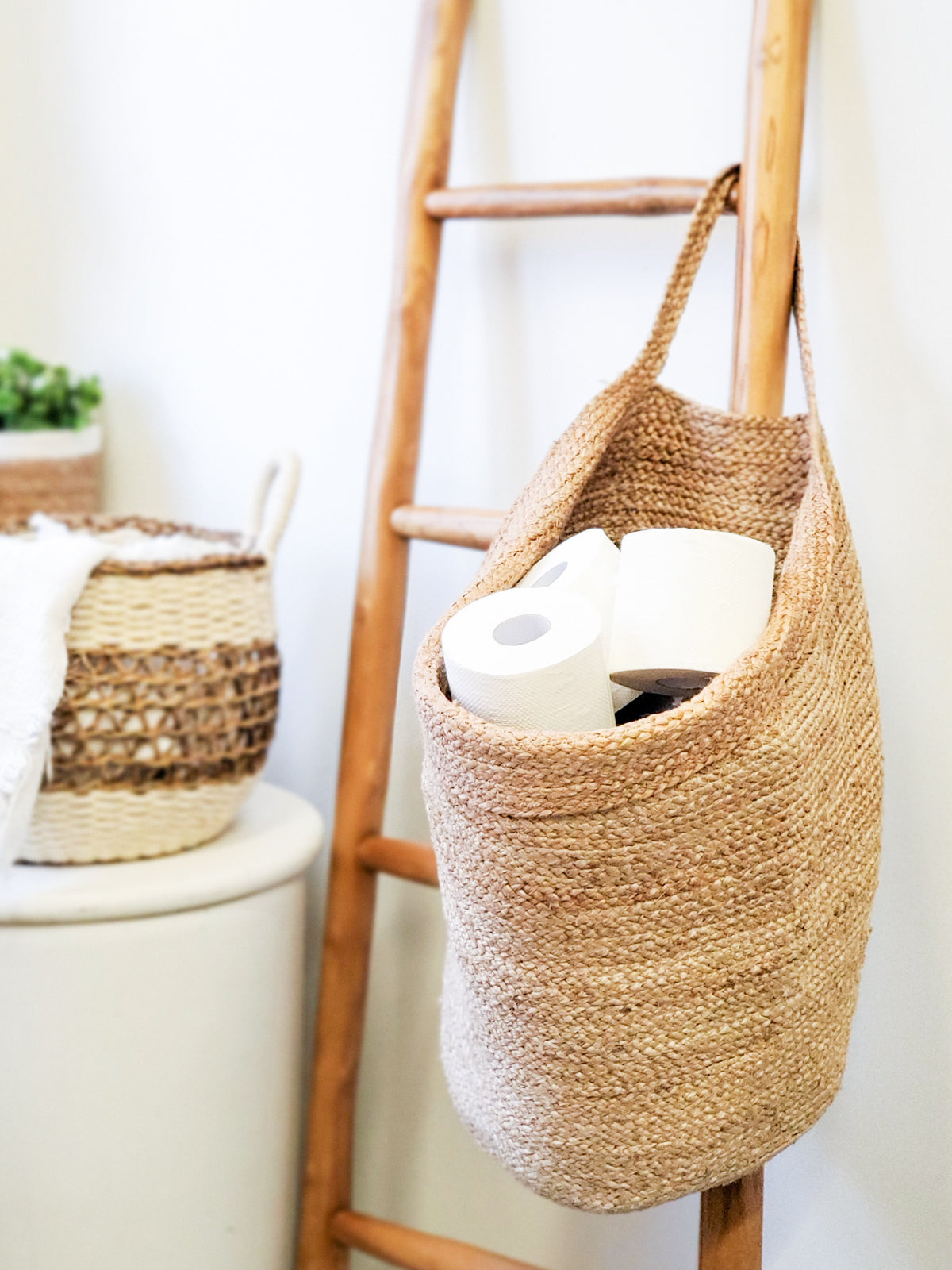 Kata Wall Storage Basket made of handwoven natural jute, showcasing its unique texture and design, perfect for home organization.