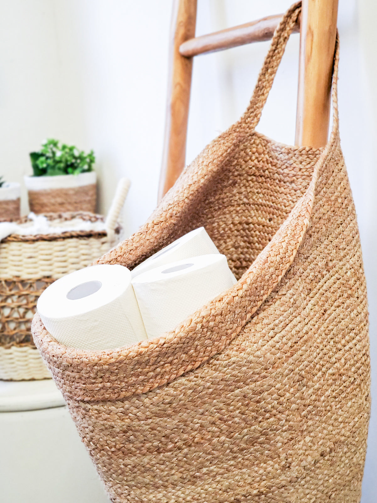 Kata Wall Storage Basket made of handwoven natural jute, showcasing its unique texture and design, perfect for home organization.