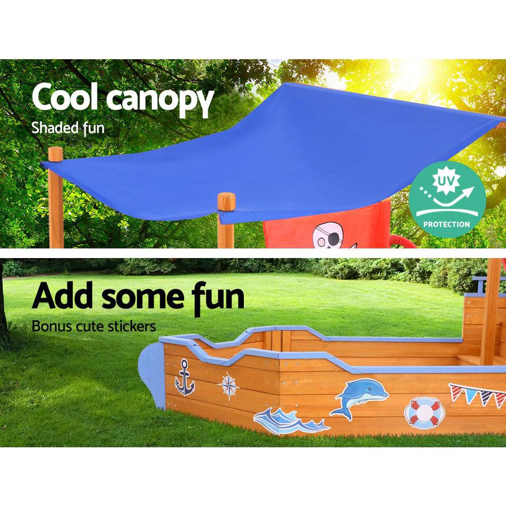 Keezi Boat Sand Pit with Canopy featuring a wooden boat design, steering wheel, and colorful cartoon stickers, perfect for outdoor play.