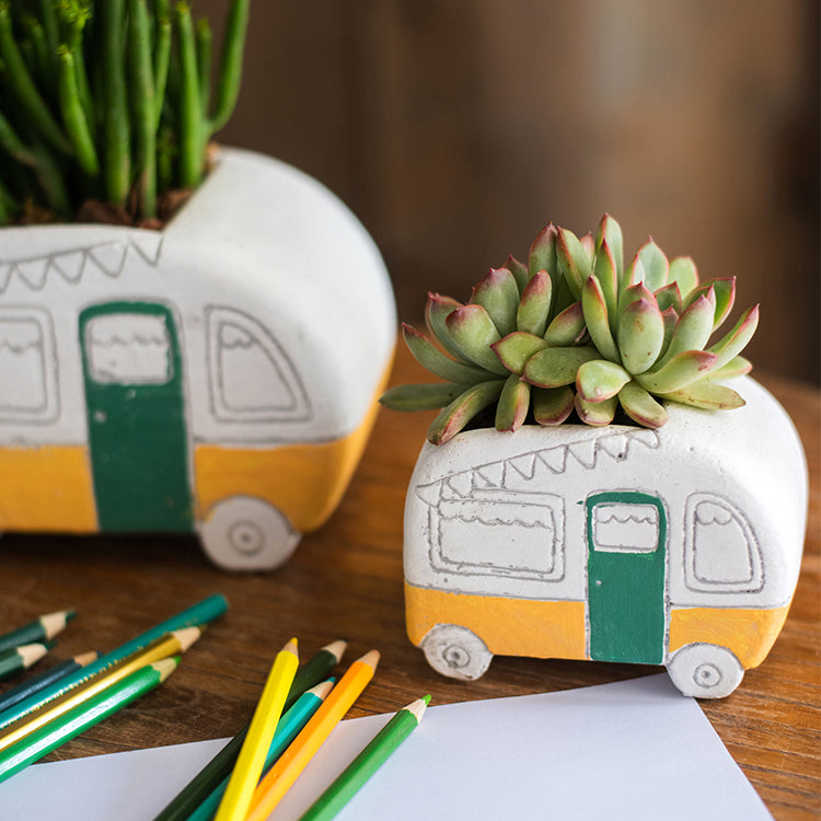 Kids Desktop Bus Planter in vibrant colors, featuring a cute bus design made of cement, perfect for small plants.