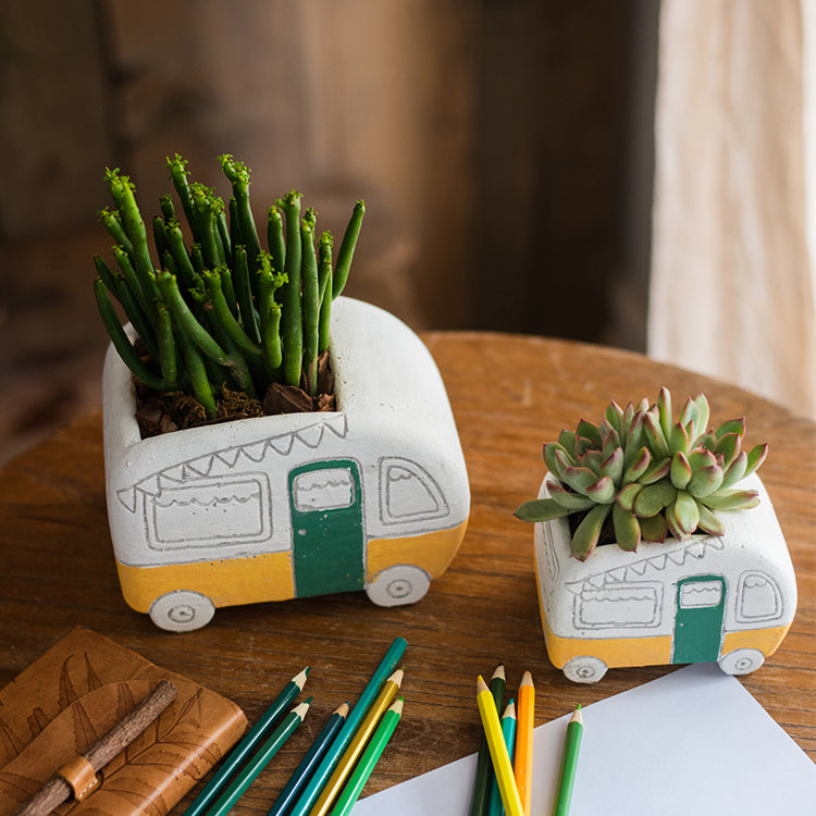 Kids Desktop Bus Planter in vibrant colors, featuring a cute bus design made of cement, perfect for small plants.