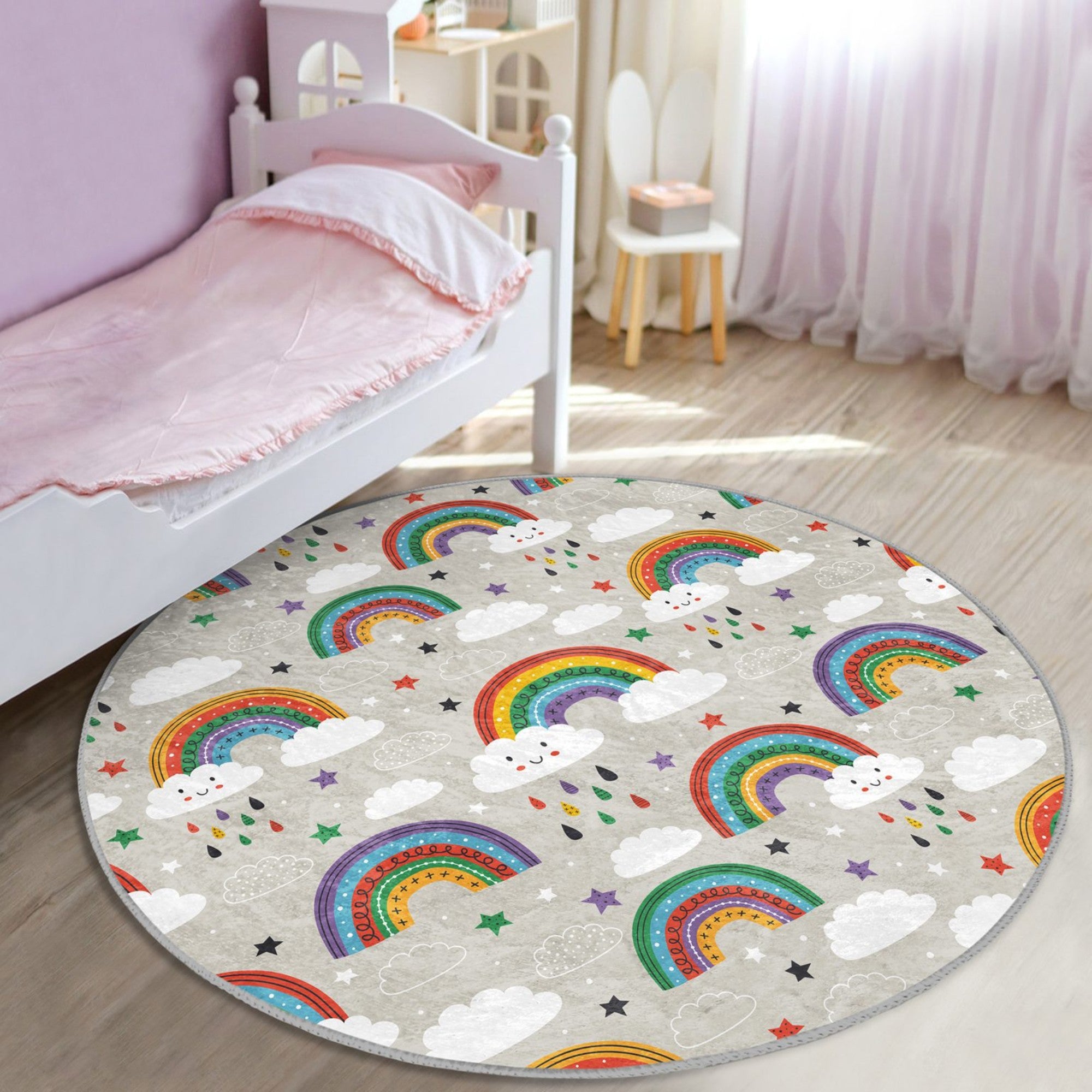 A colorful round rug featuring a cheerful rainbow pattern, designed for kids' rooms, showcasing its soft texture and vibrant colors.