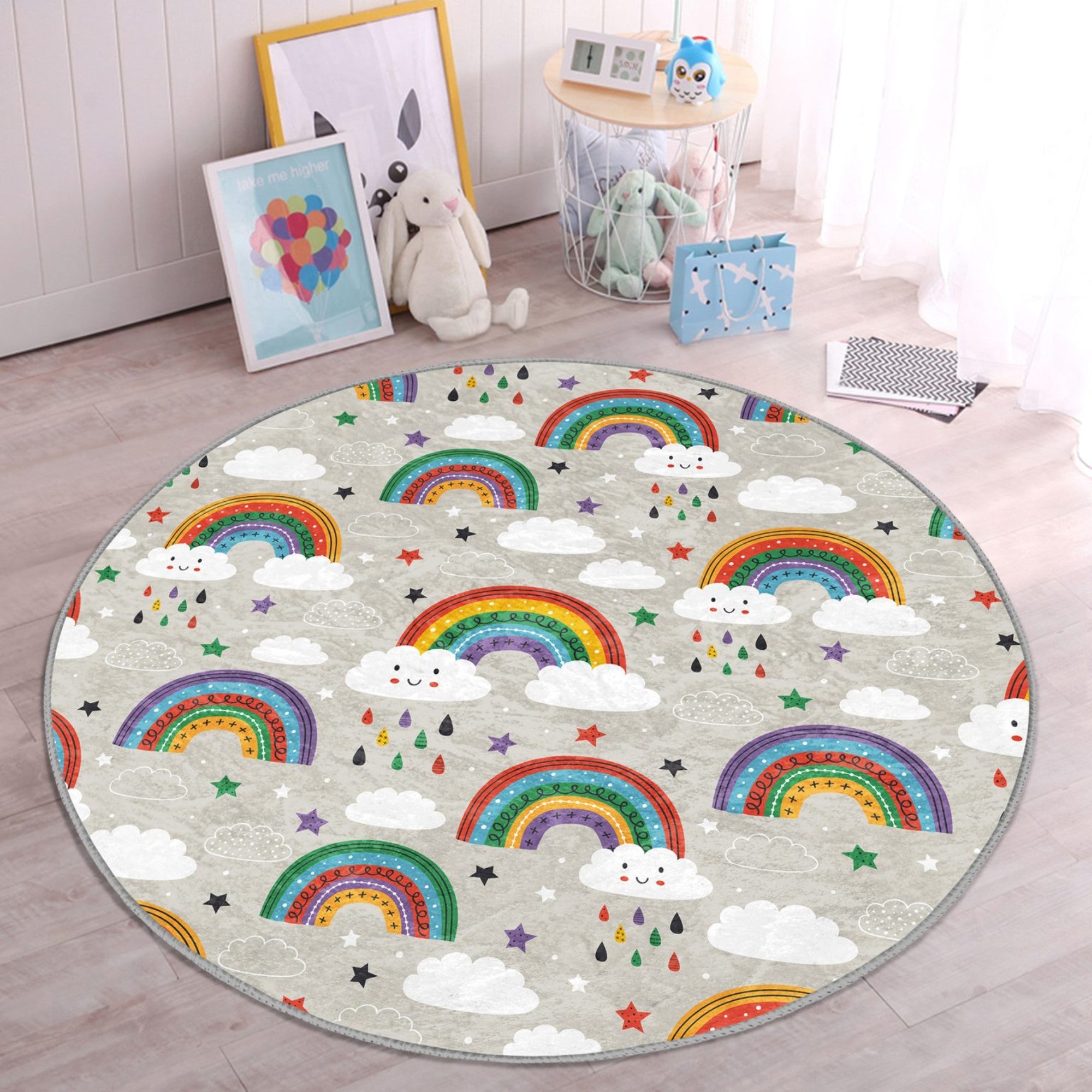 A colorful round rug featuring a cheerful rainbow pattern, designed for kids' rooms, showcasing its soft texture and vibrant colors.