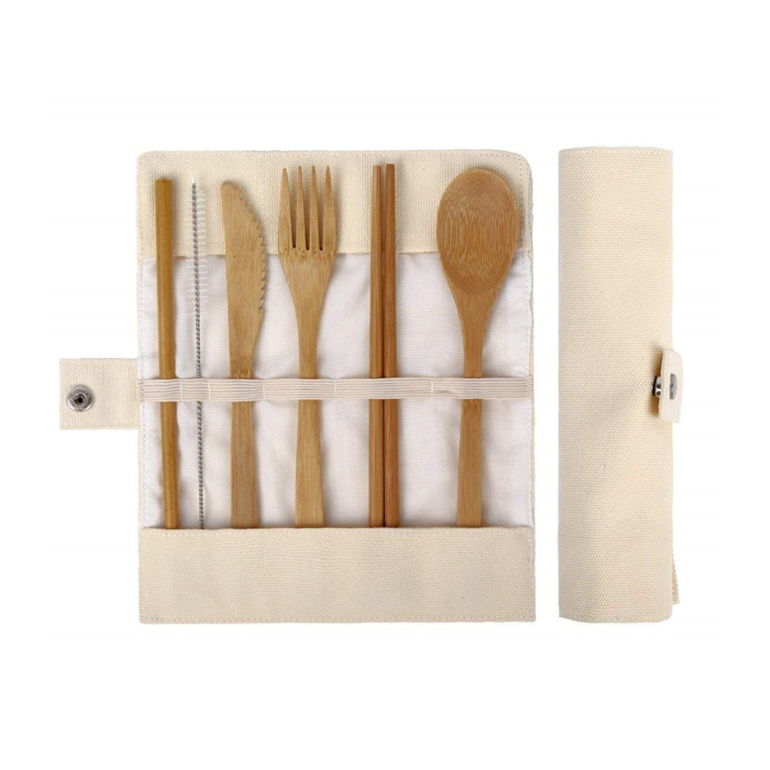 Kiwi Eco Box containing 12 eco-friendly products for a zero-waste lifestyle, including bamboo cutlery, silicone lids, and loofah sponges.