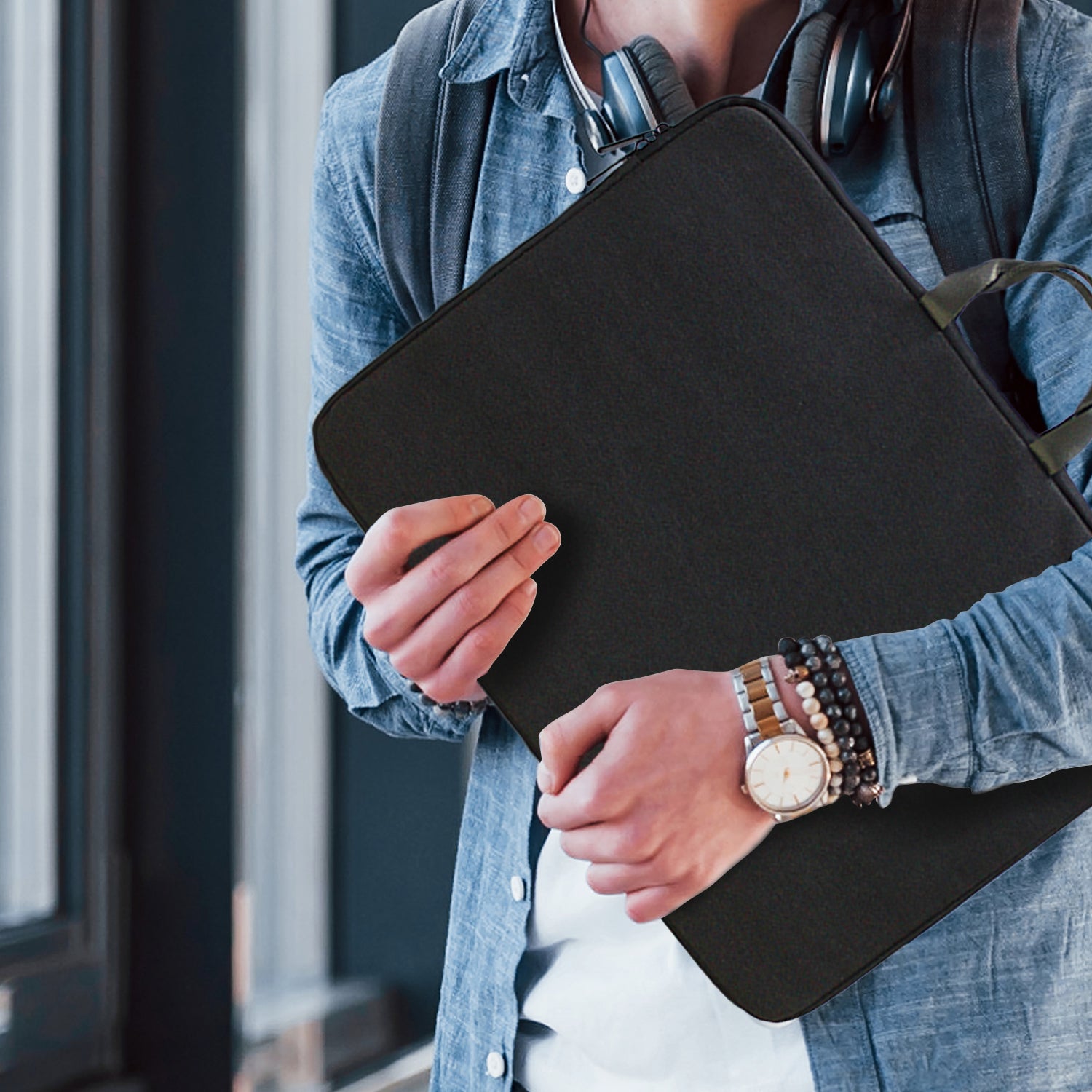 Klika 15.6” Water-Resistant Laptop Sleeve Bag in black, showcasing dual zippers and soft suede lining.